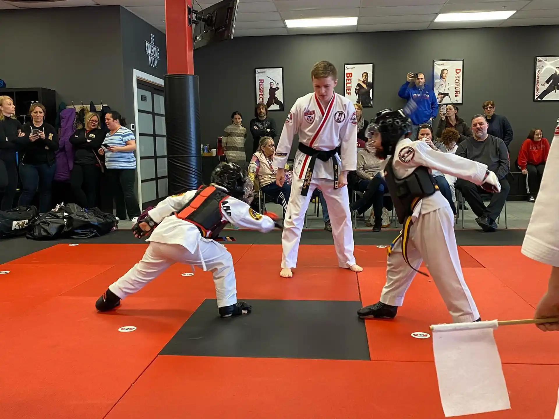 a group of people in a martial arts class
