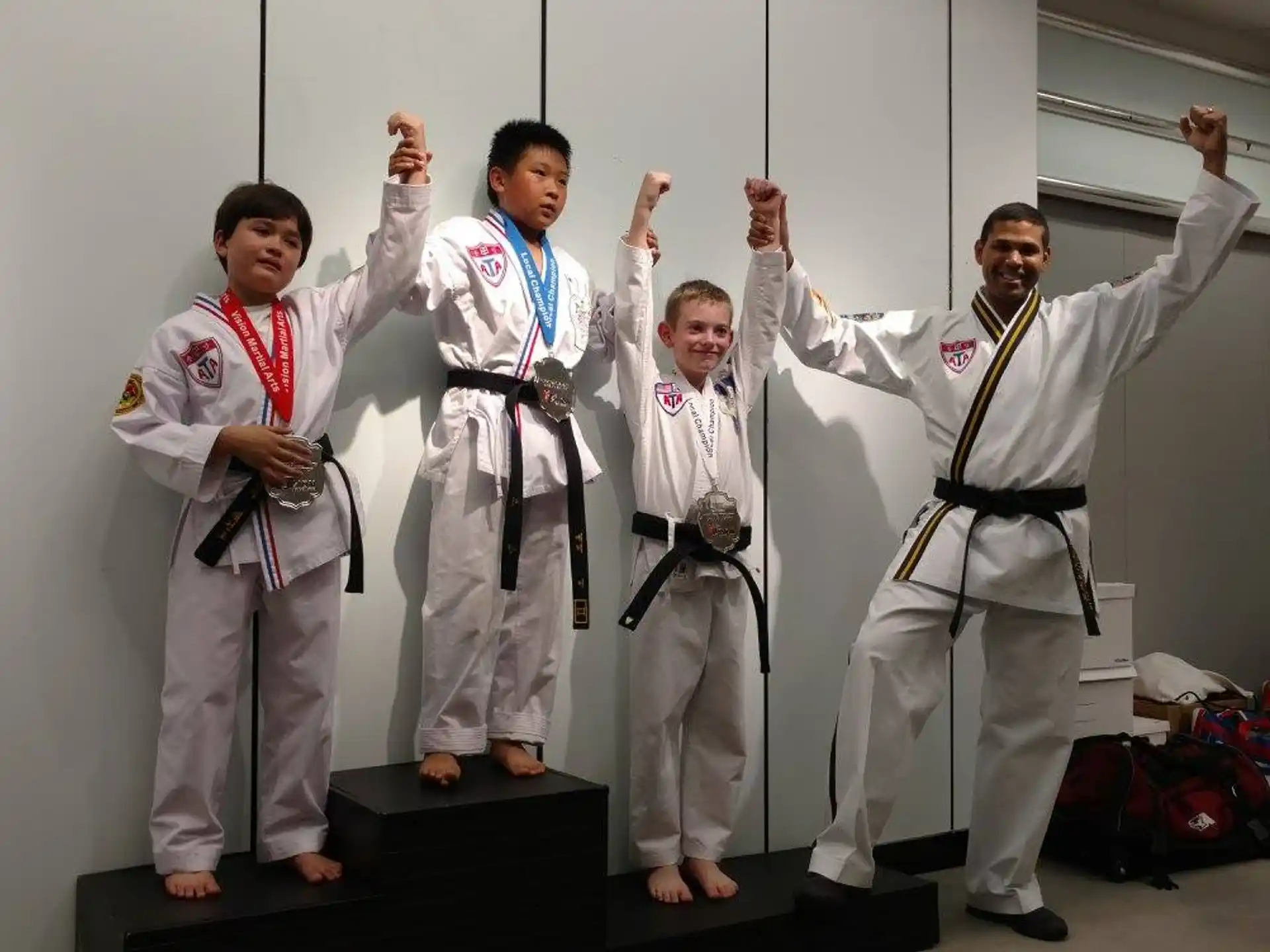 a group of men in white suits