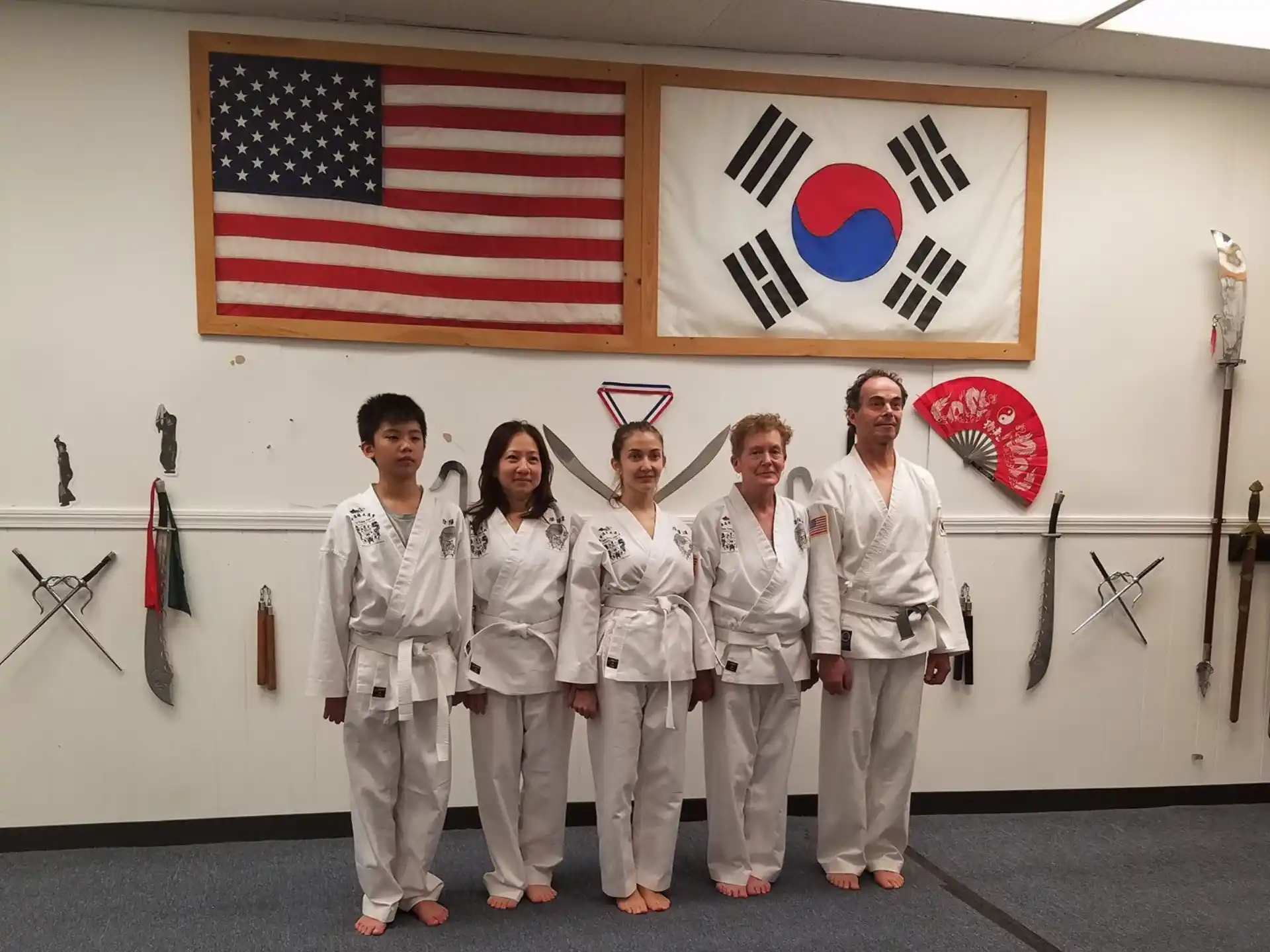 a group of people in white uniforms