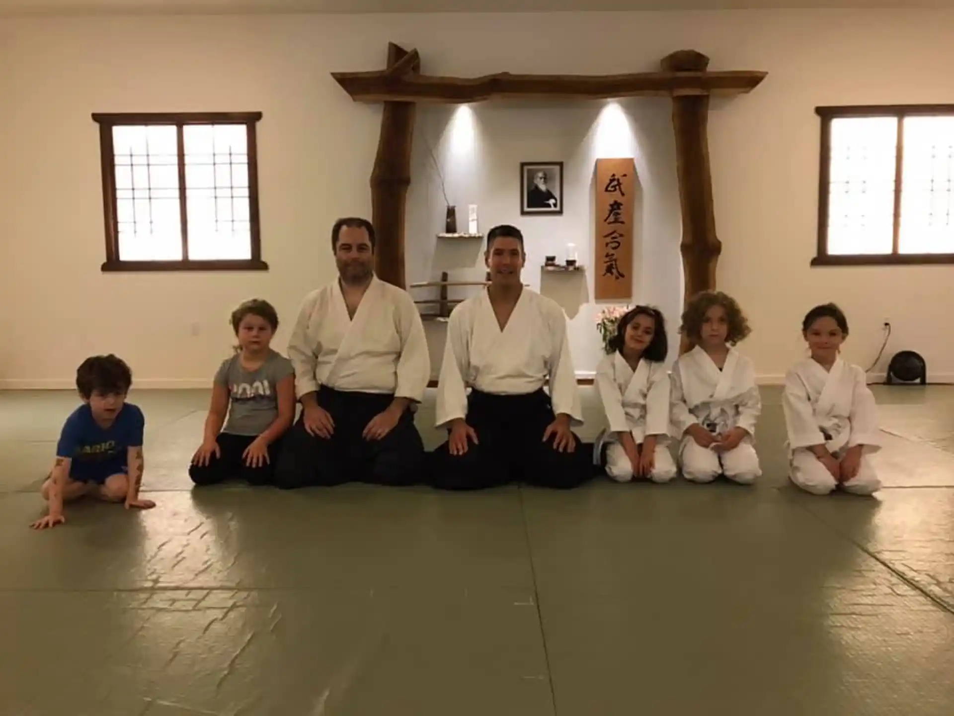 a group of people sitting on the floor