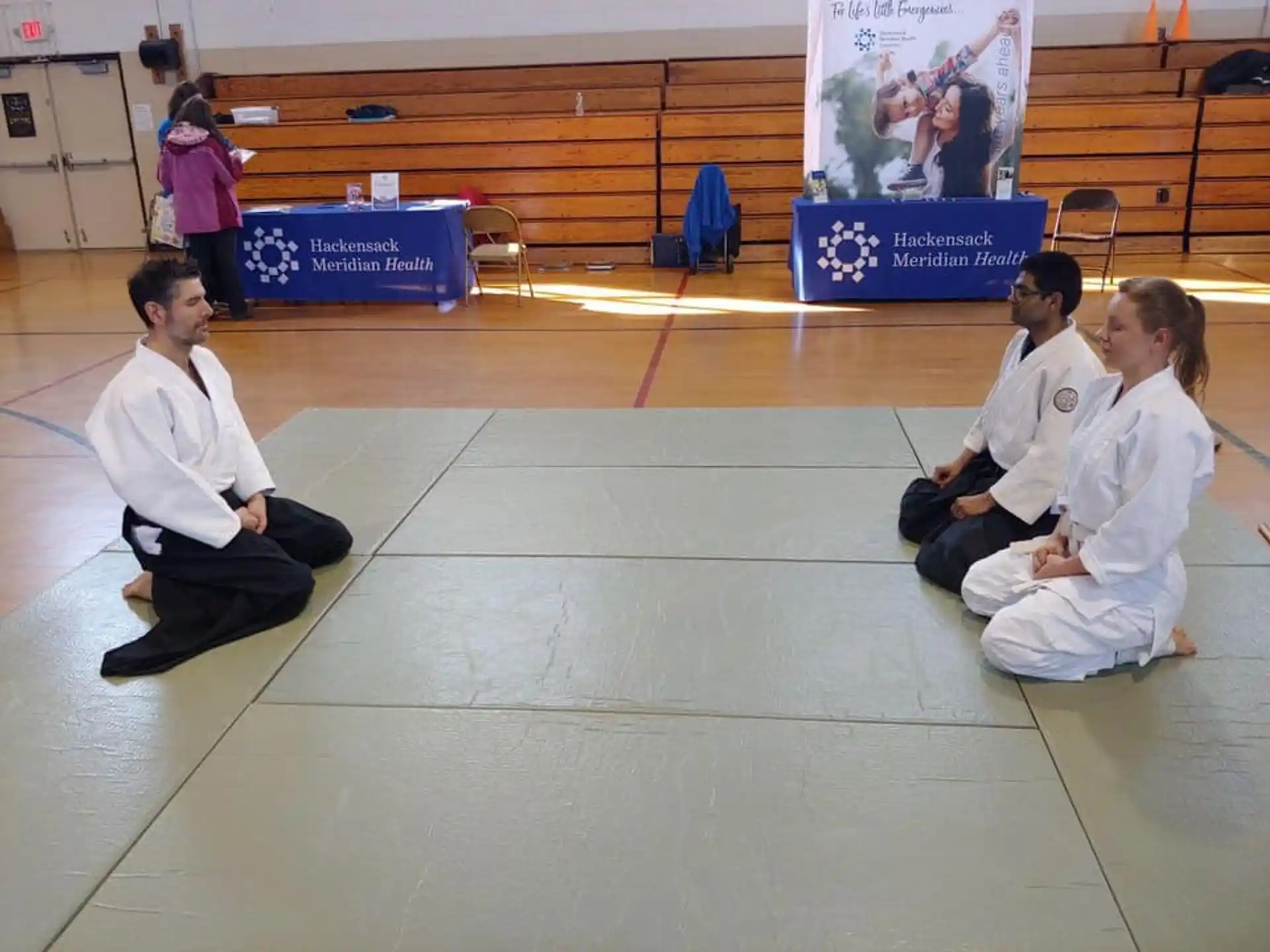 a group of people sitting on the floor
