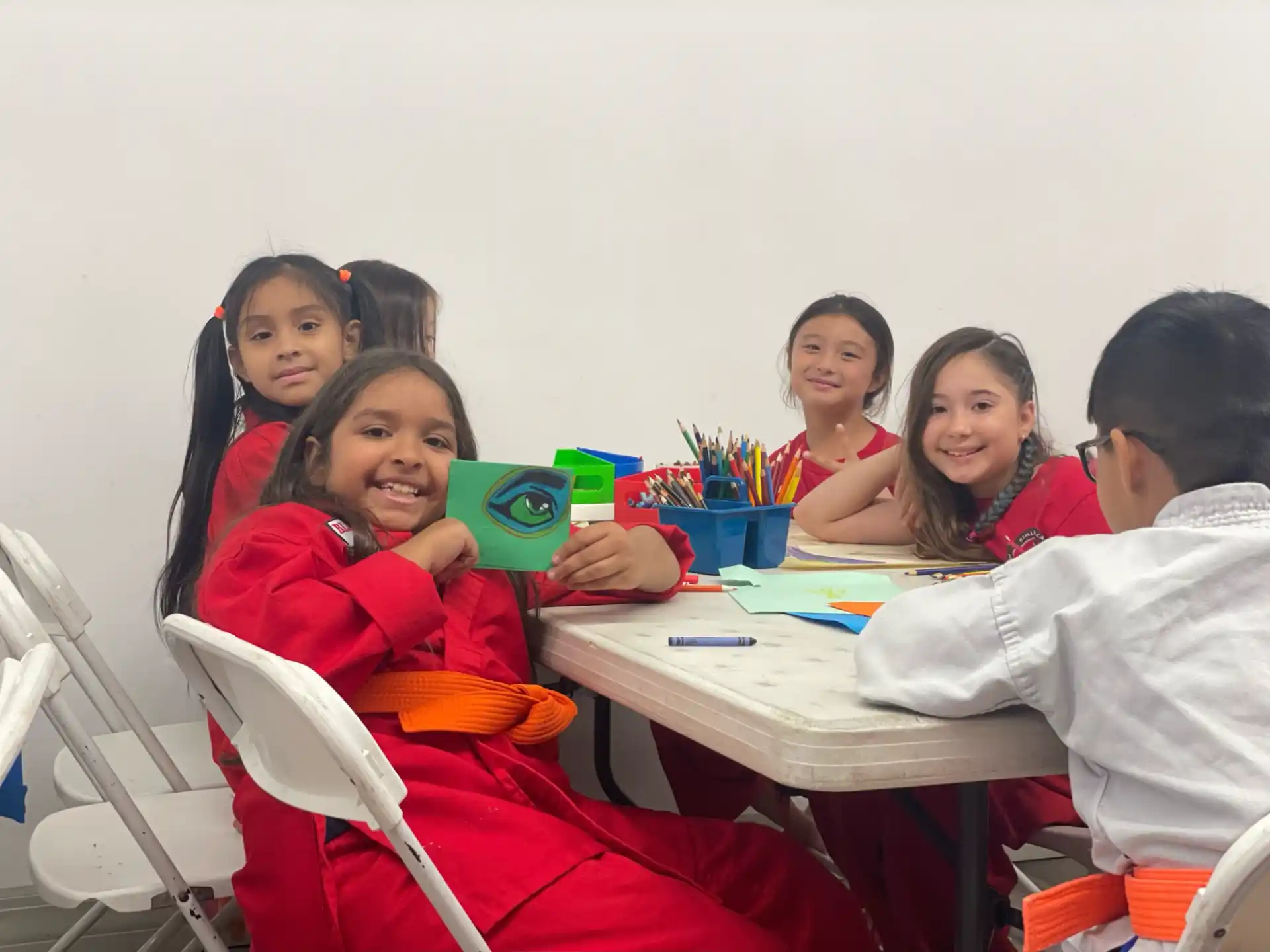 a group of people sitting at a table