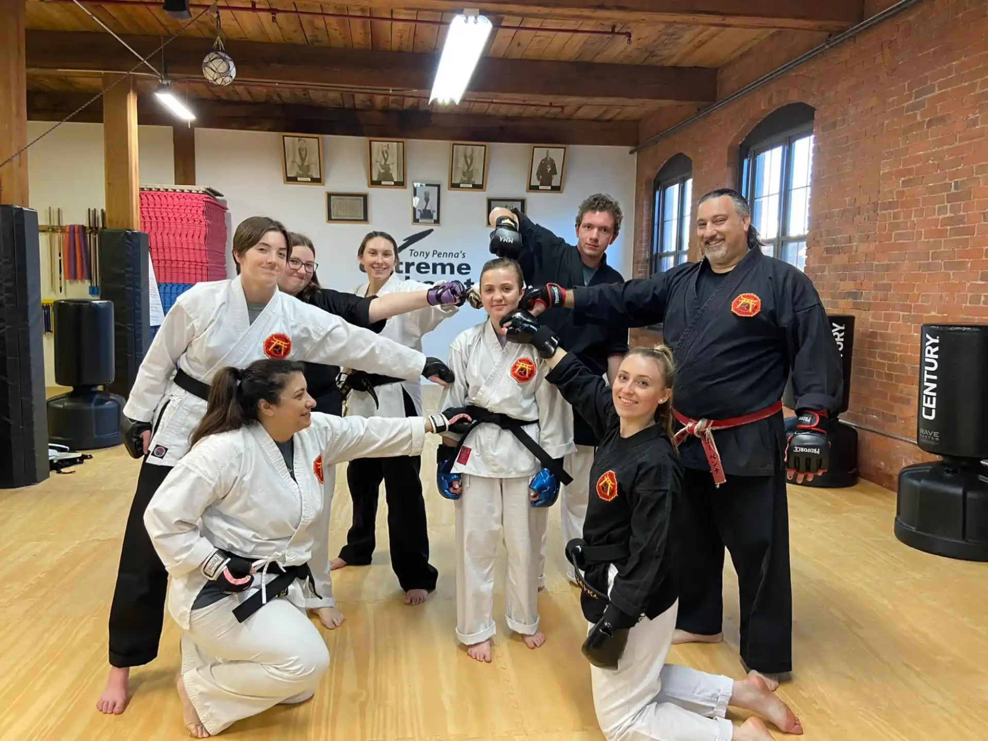 a group of people in karate uniforms
