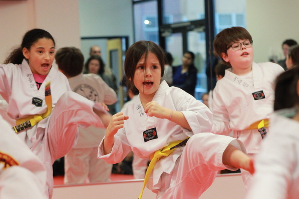 a group of people wearing karate uniforms