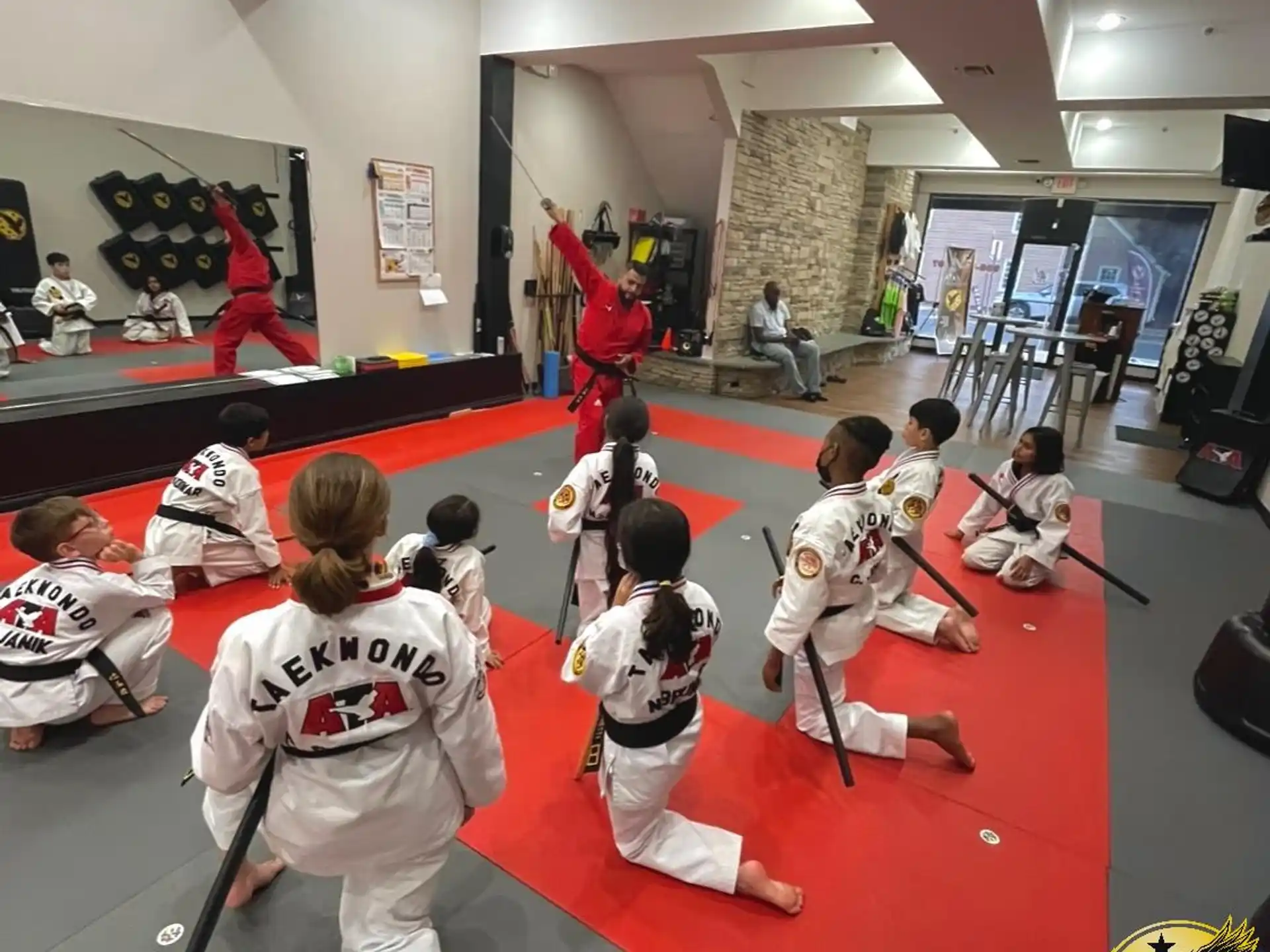 a group of people in karate uniforms