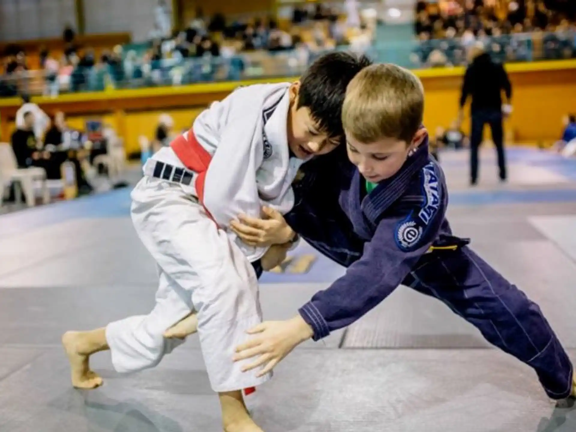 two boys in karate uniforms