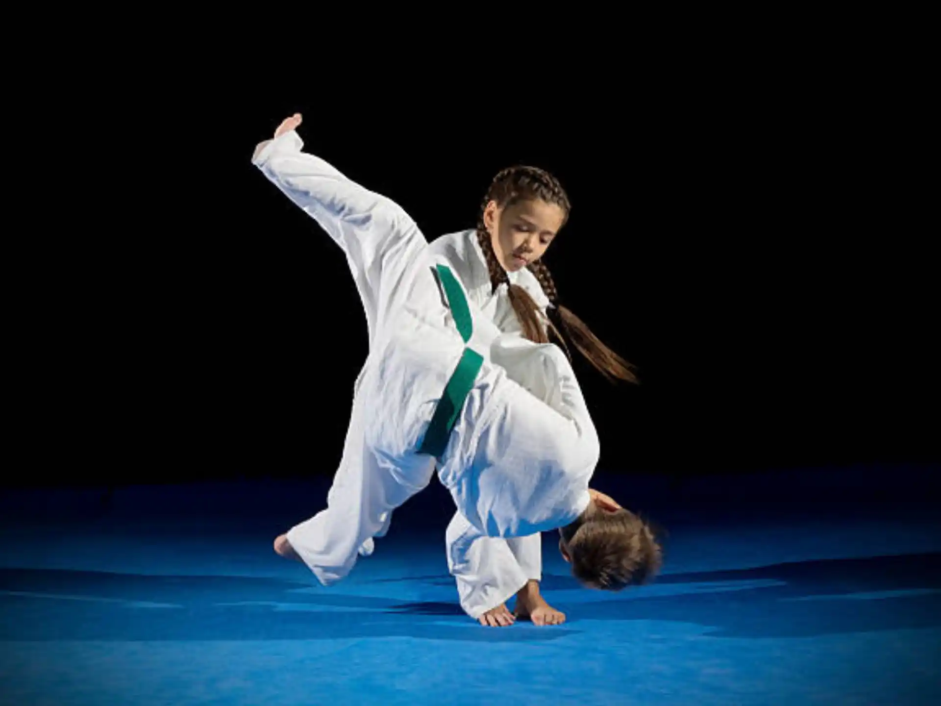 a man and woman dancing on a stage