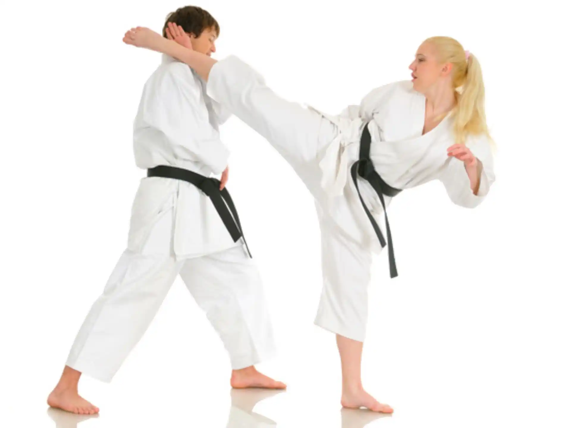 a man and a woman in karate uniforms
