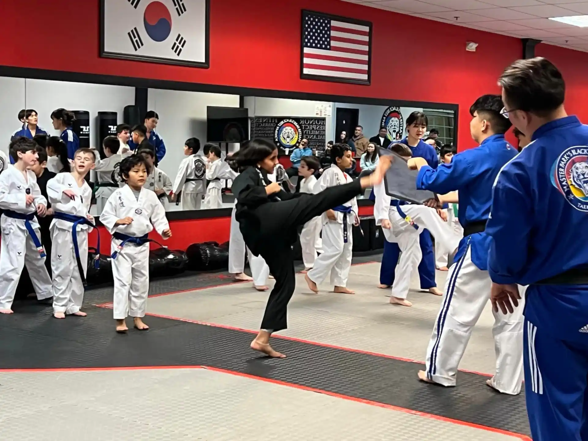 a group of people in karate uniforms