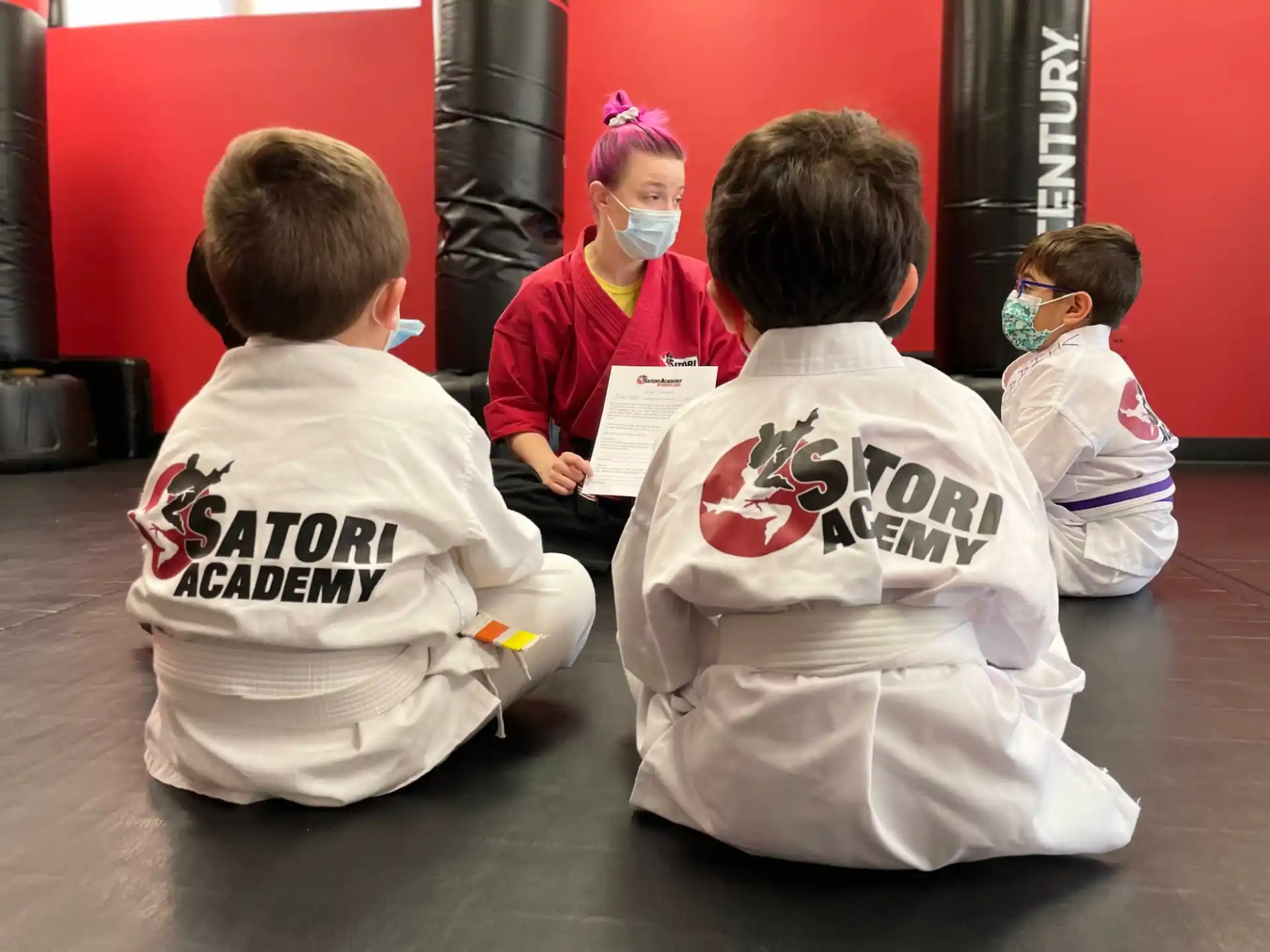 a group of kids wearing masks