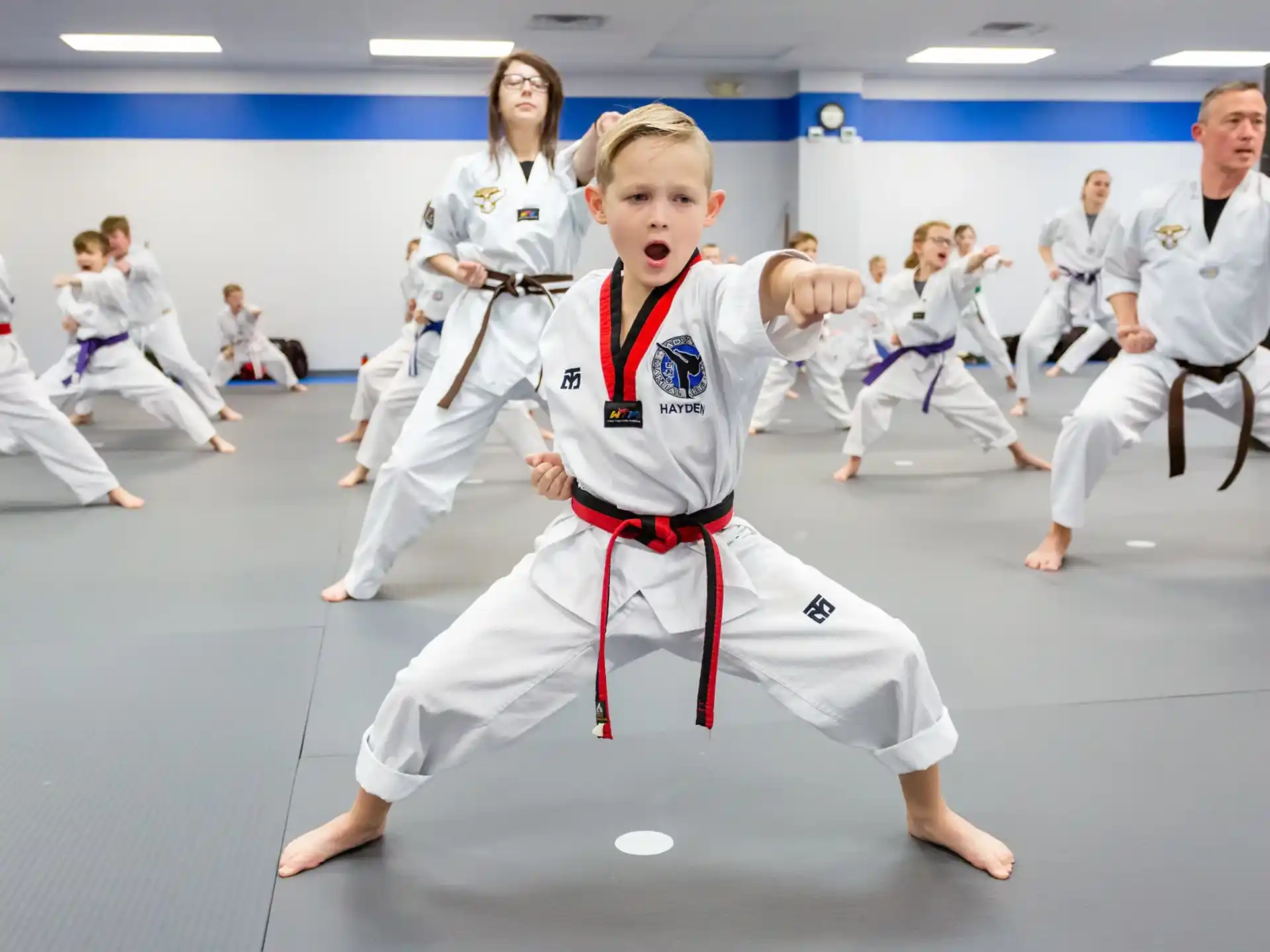 a group of people in karate uniforms