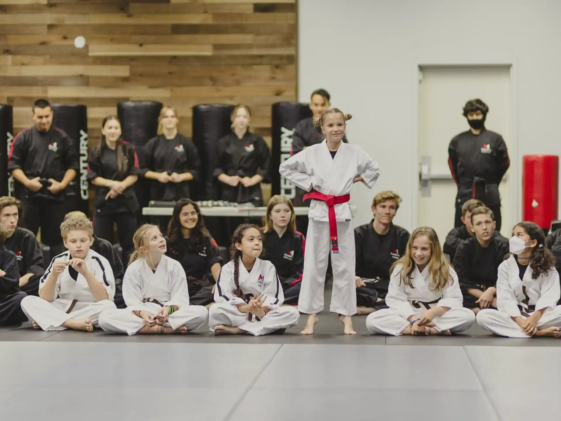 a group of people sitting on a stage