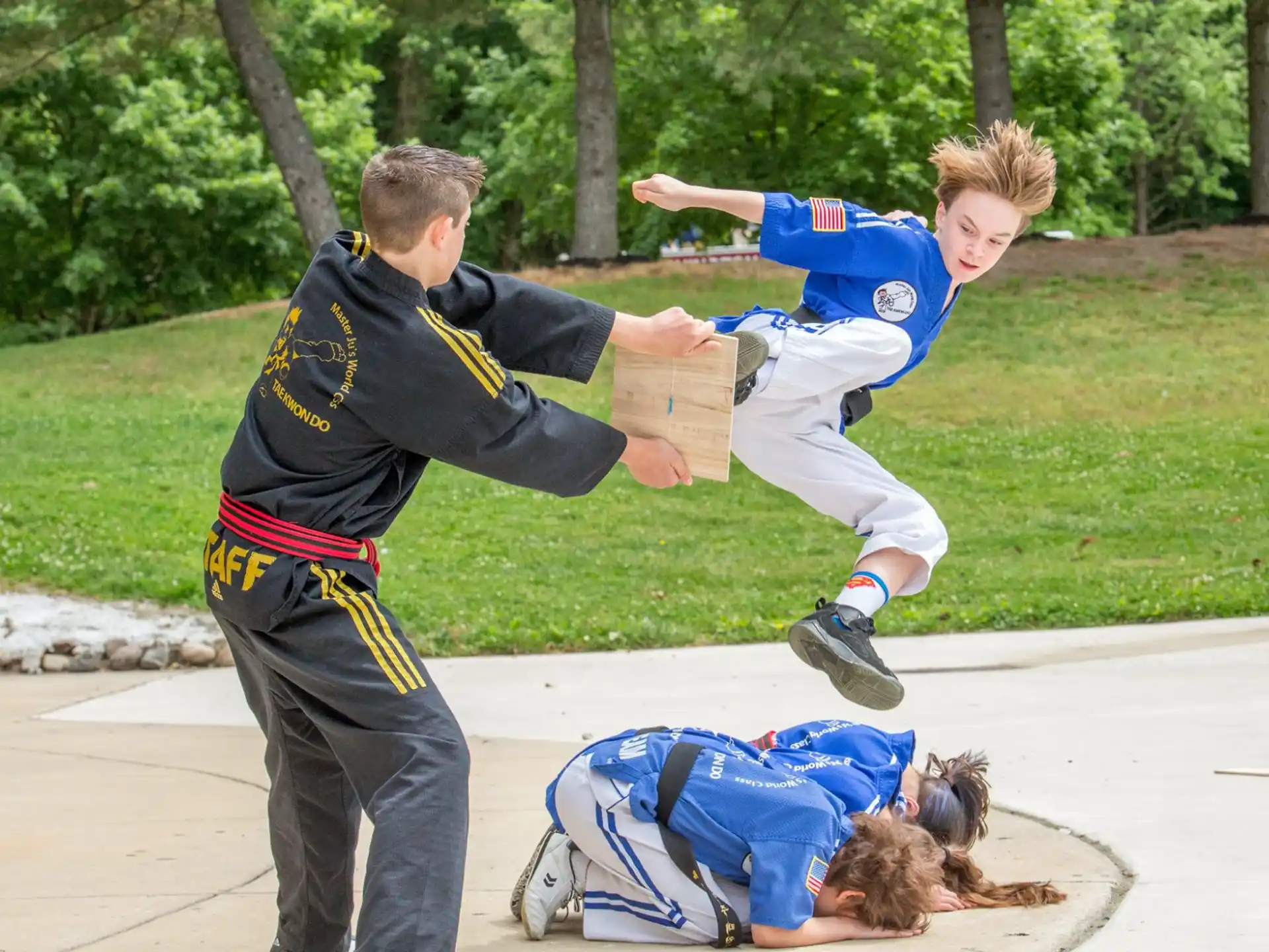 a man running with a child on his back
