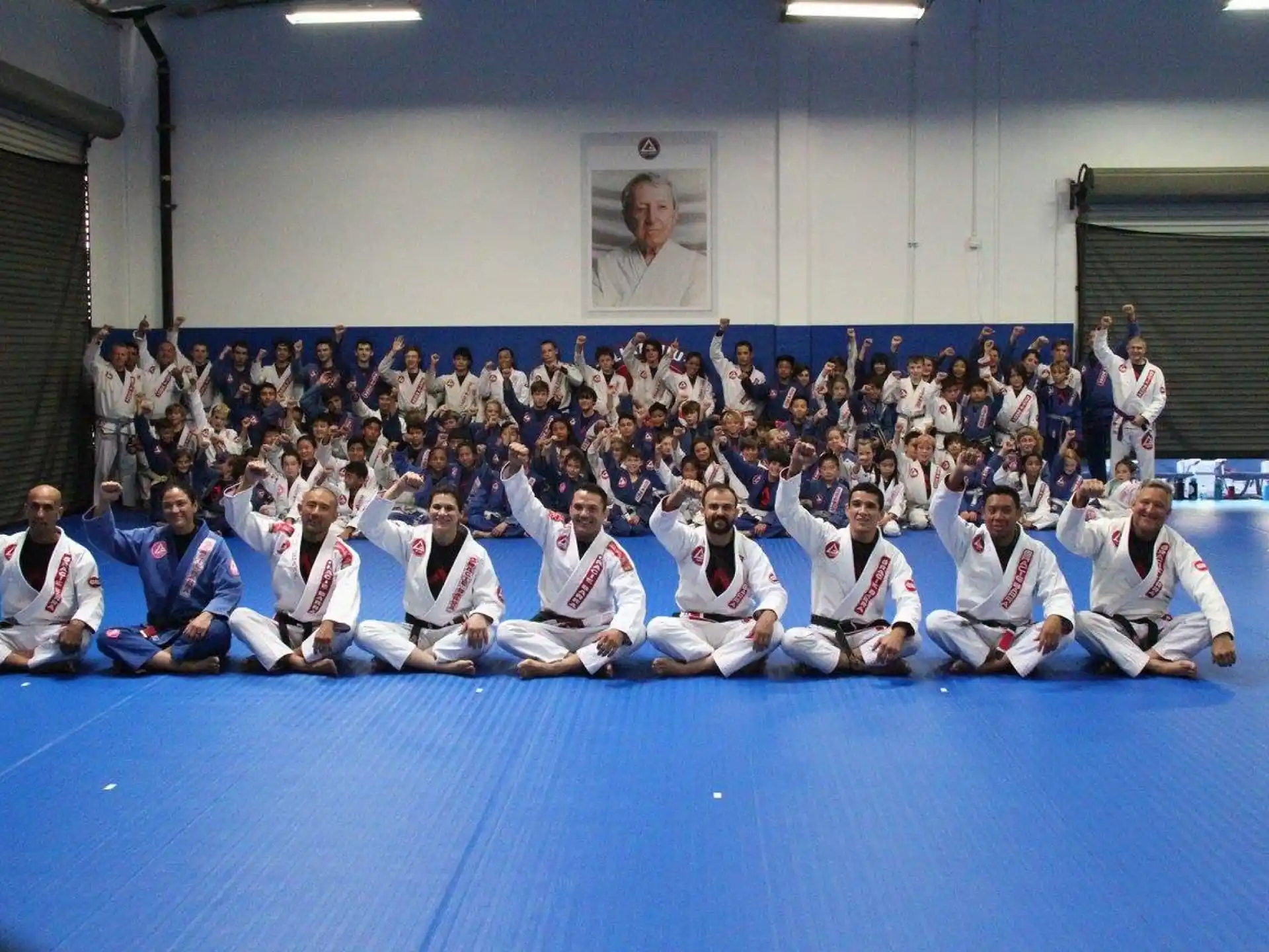 a group of people in white uniforms