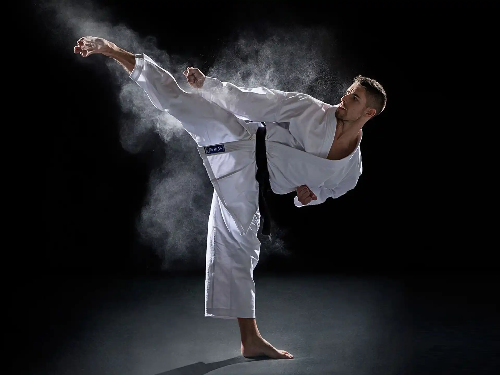 a man in white karate uniform