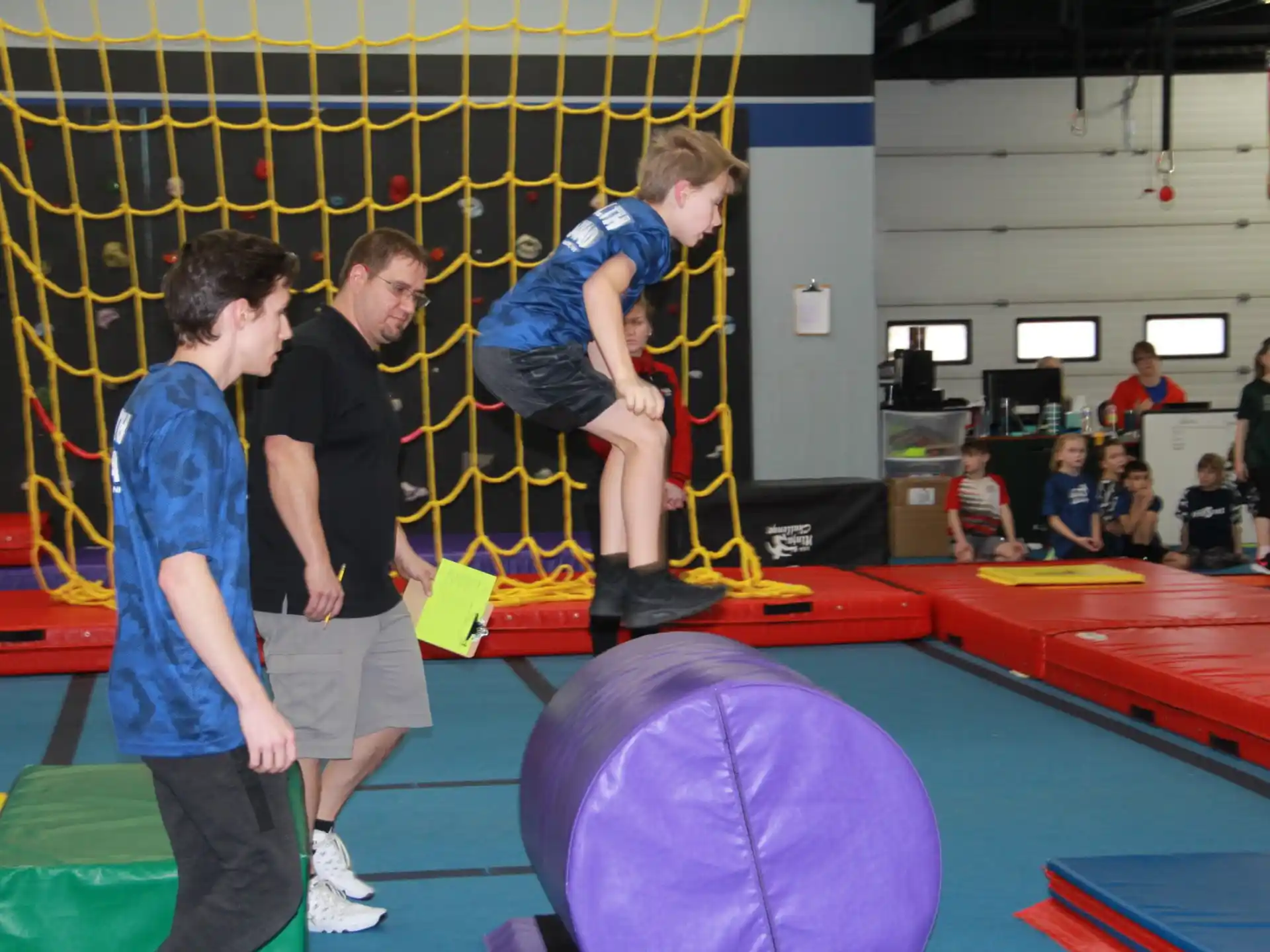 a group of people in a gym