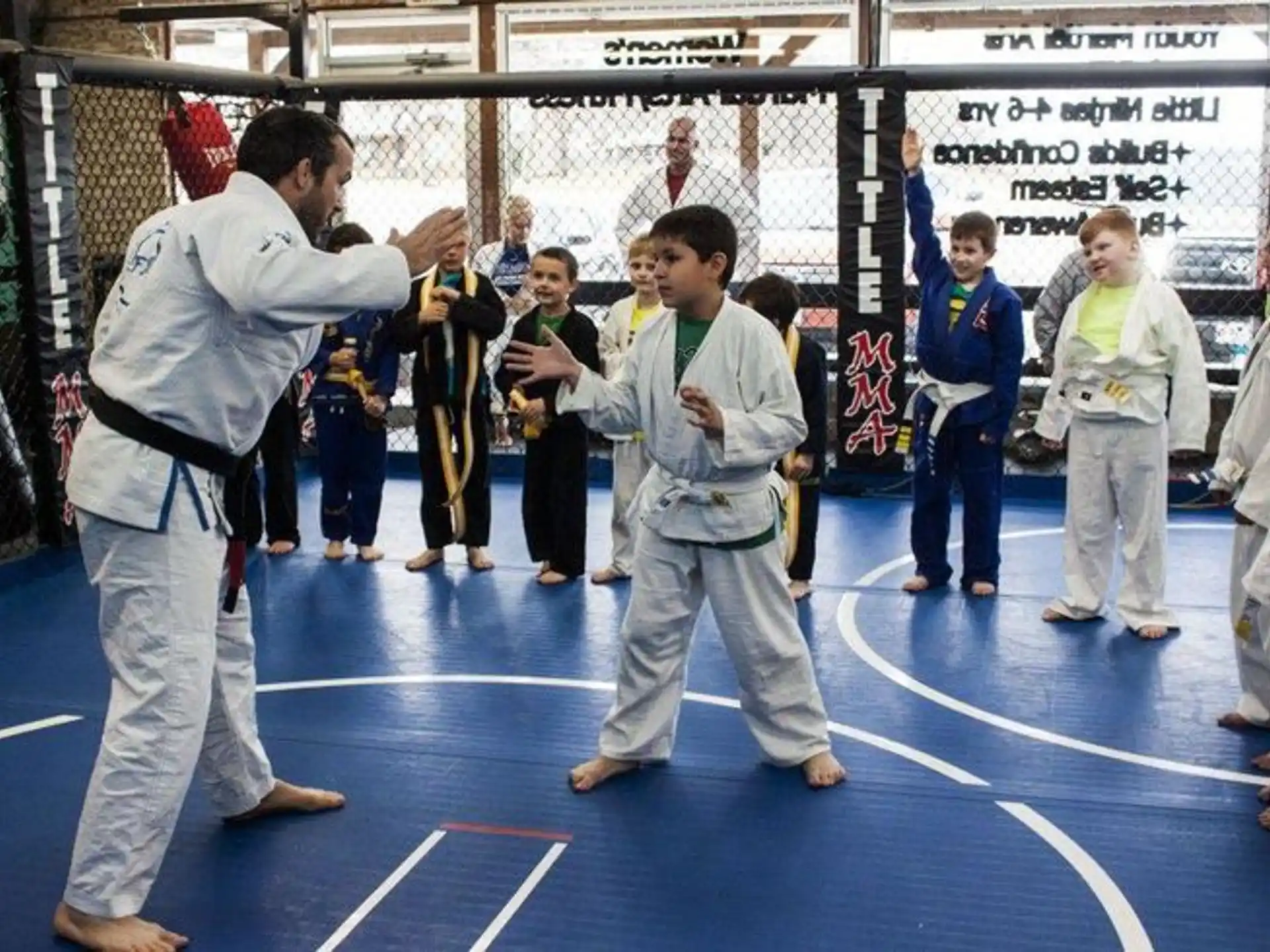 a group of people in karate uniforms