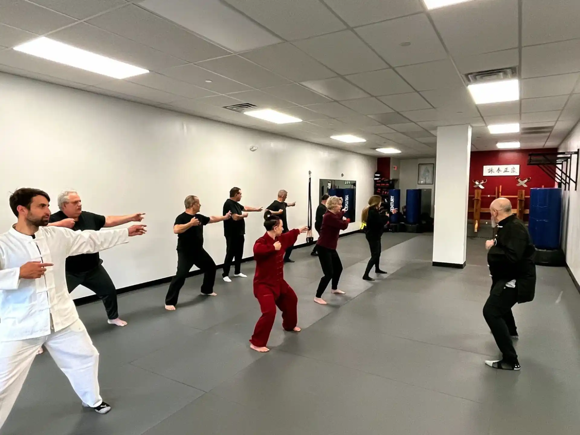 a group of people dancing in a room