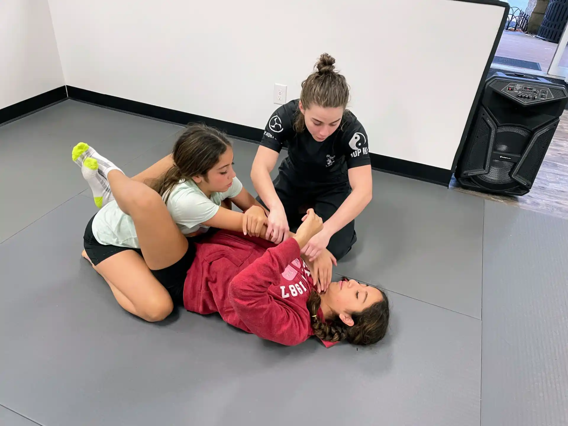 a group of people sitting on the floor