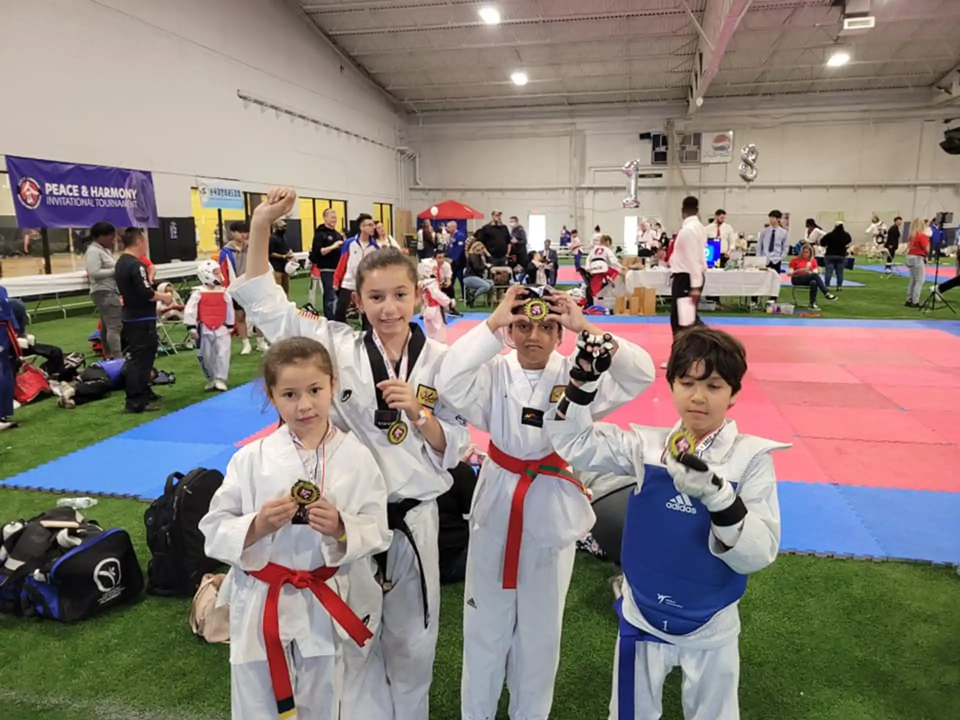a group of people in karate uniforms