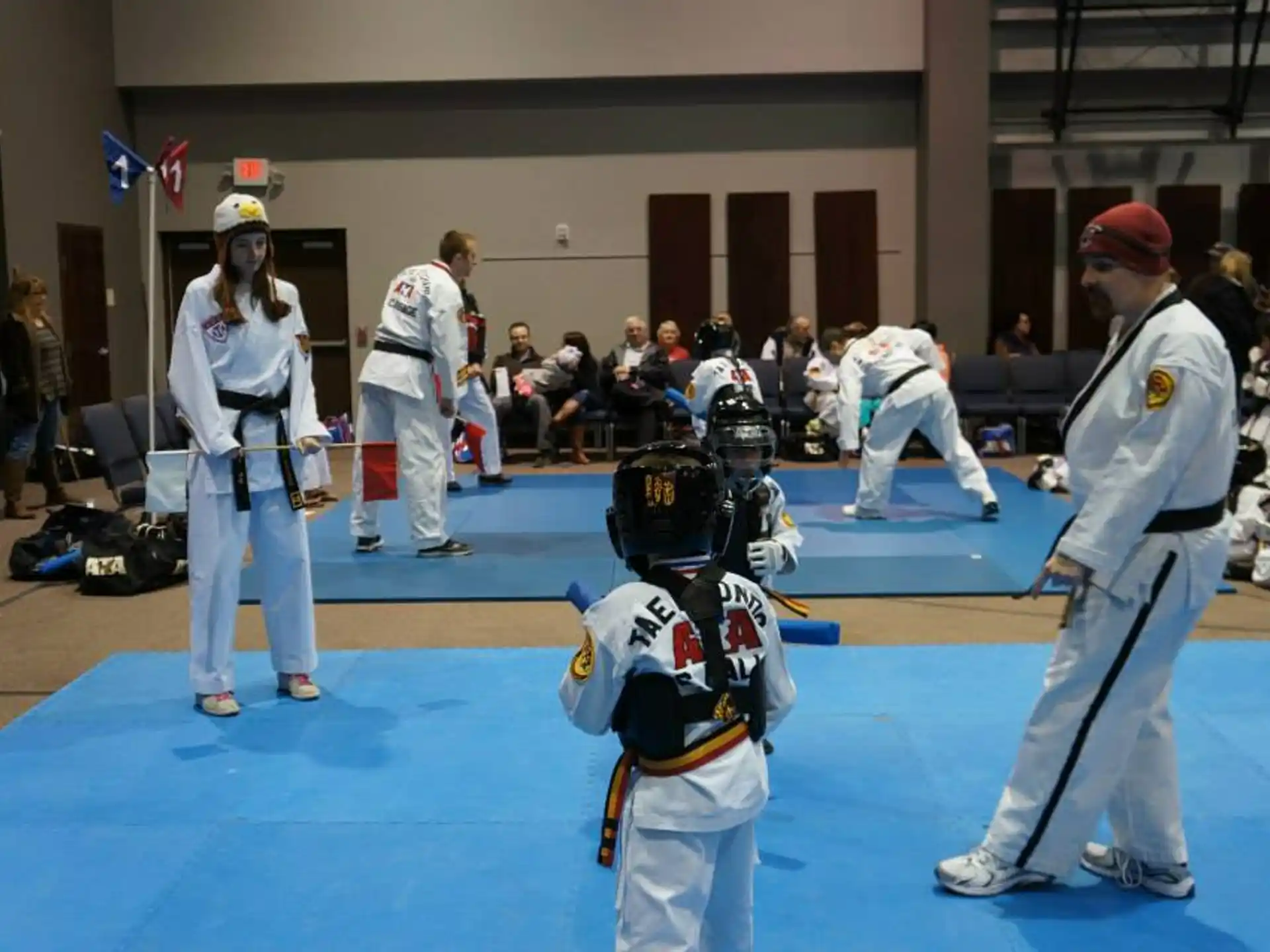a group of people in a karate class
