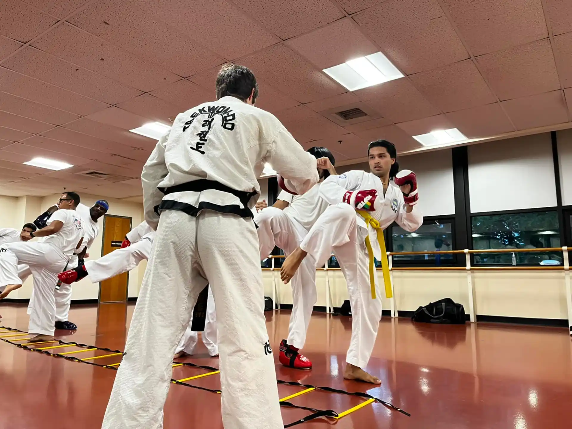 a group of people in karate uniforms