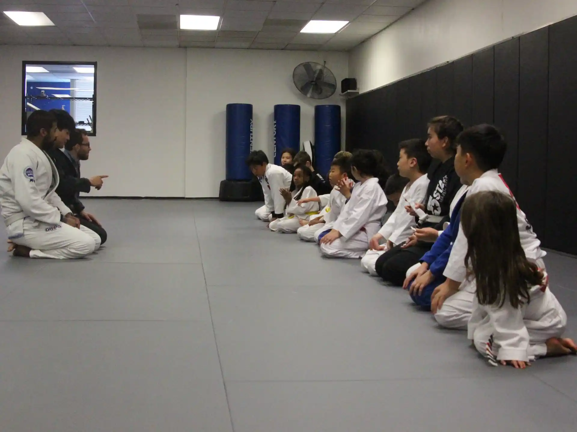 a group of people sitting in a room