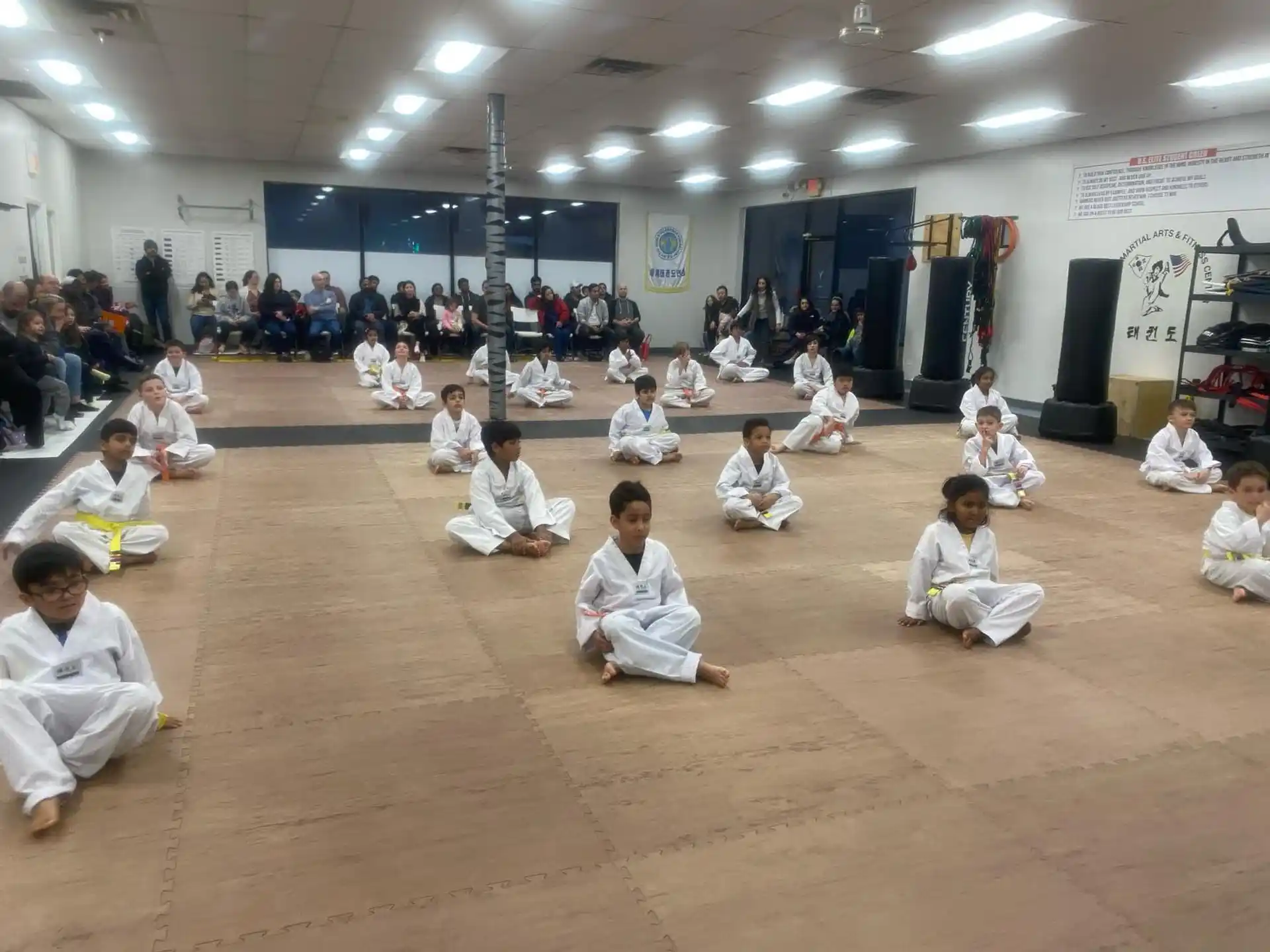 a group of people sitting on the floor
