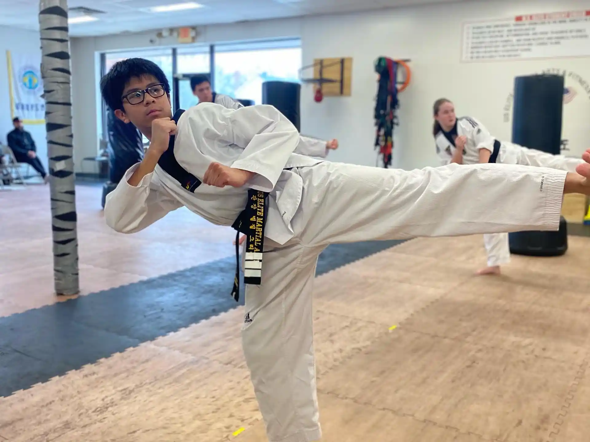 a man in a karate uniform