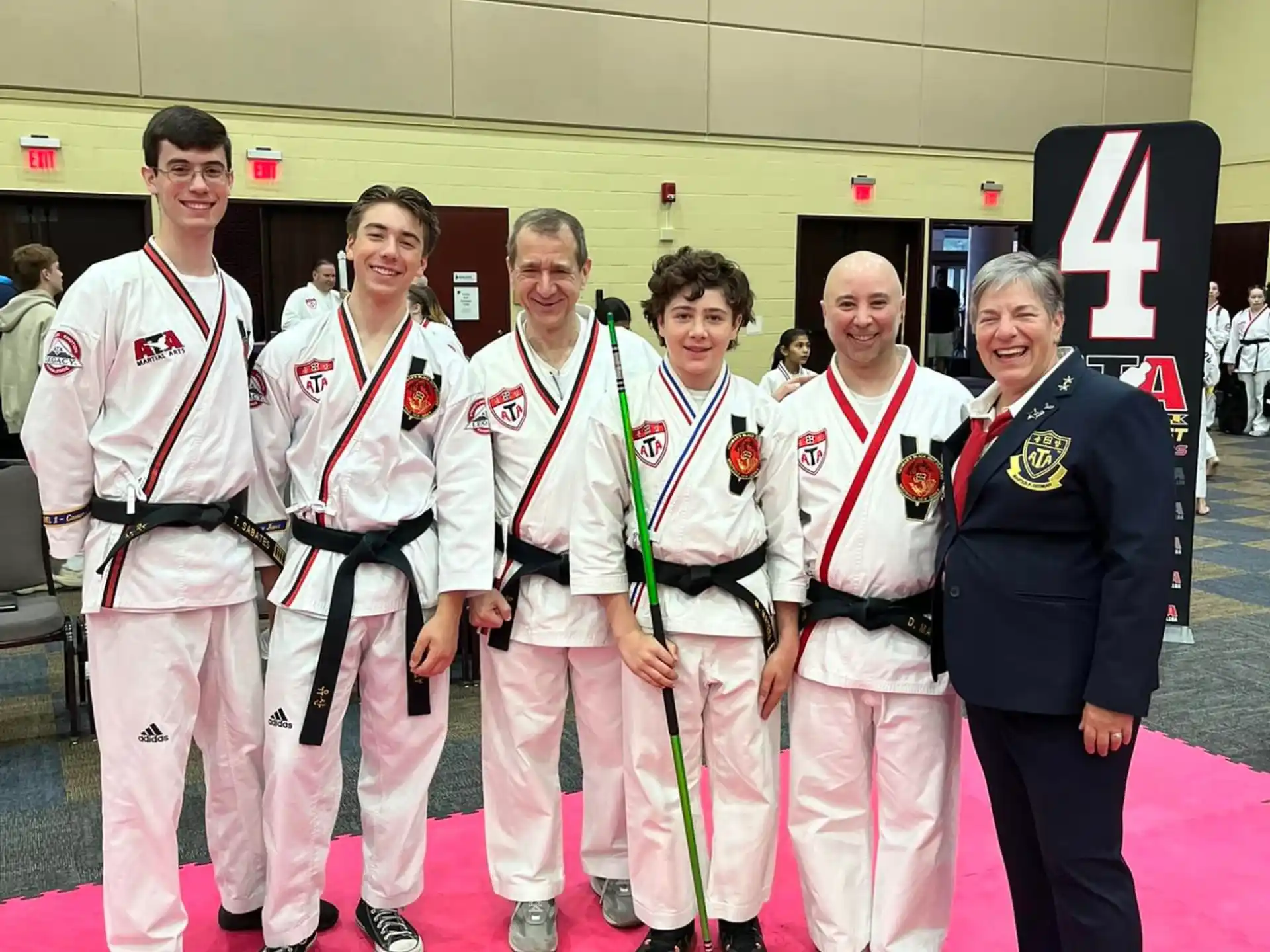 a group of people in sports uniforms