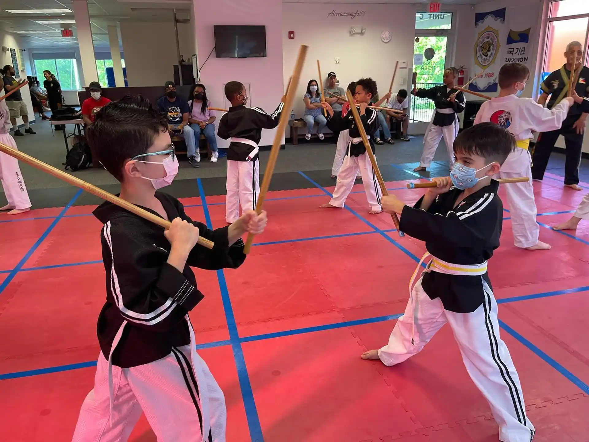 a group of kids practicing karate