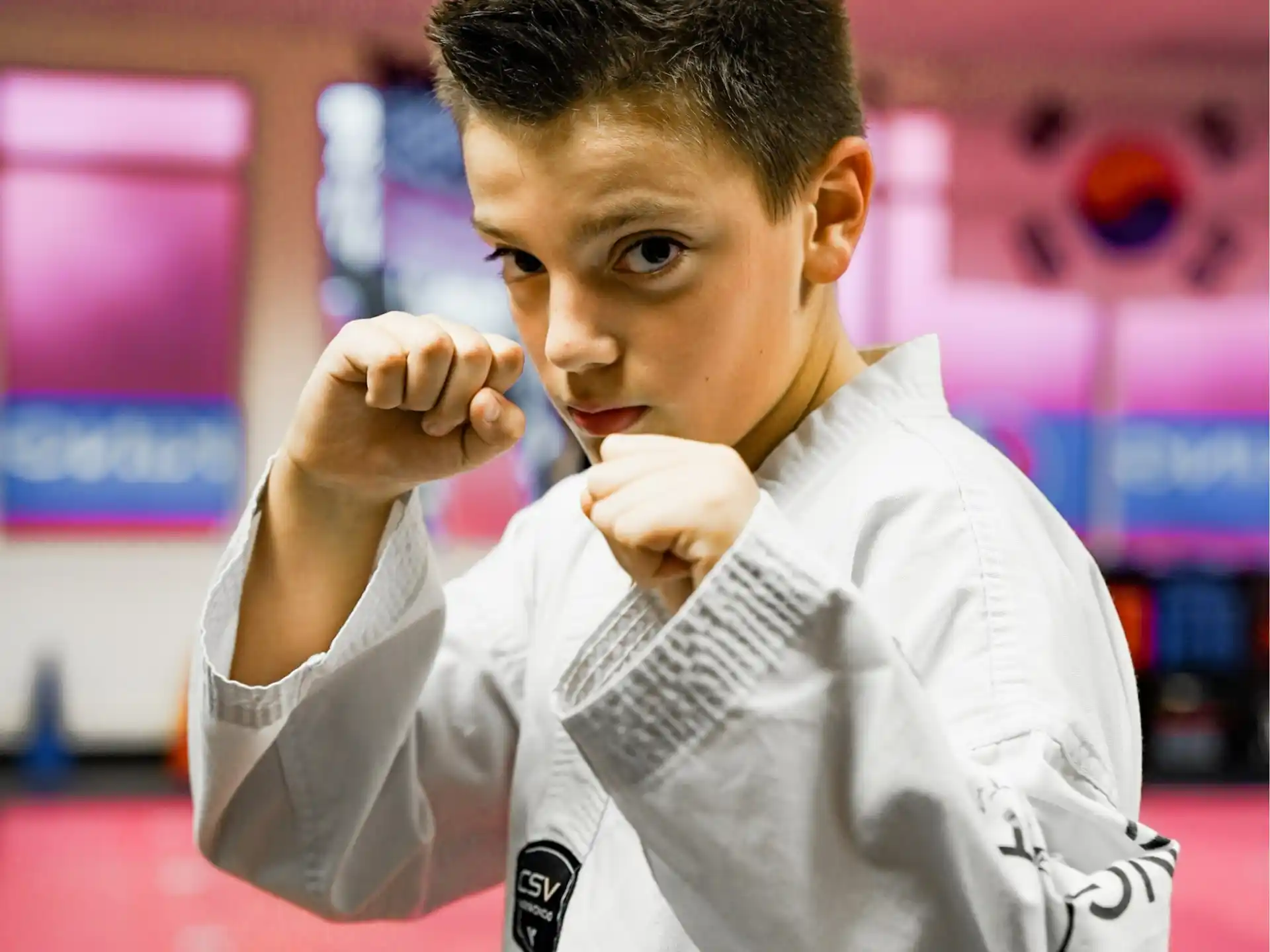 a man in a karate uniform