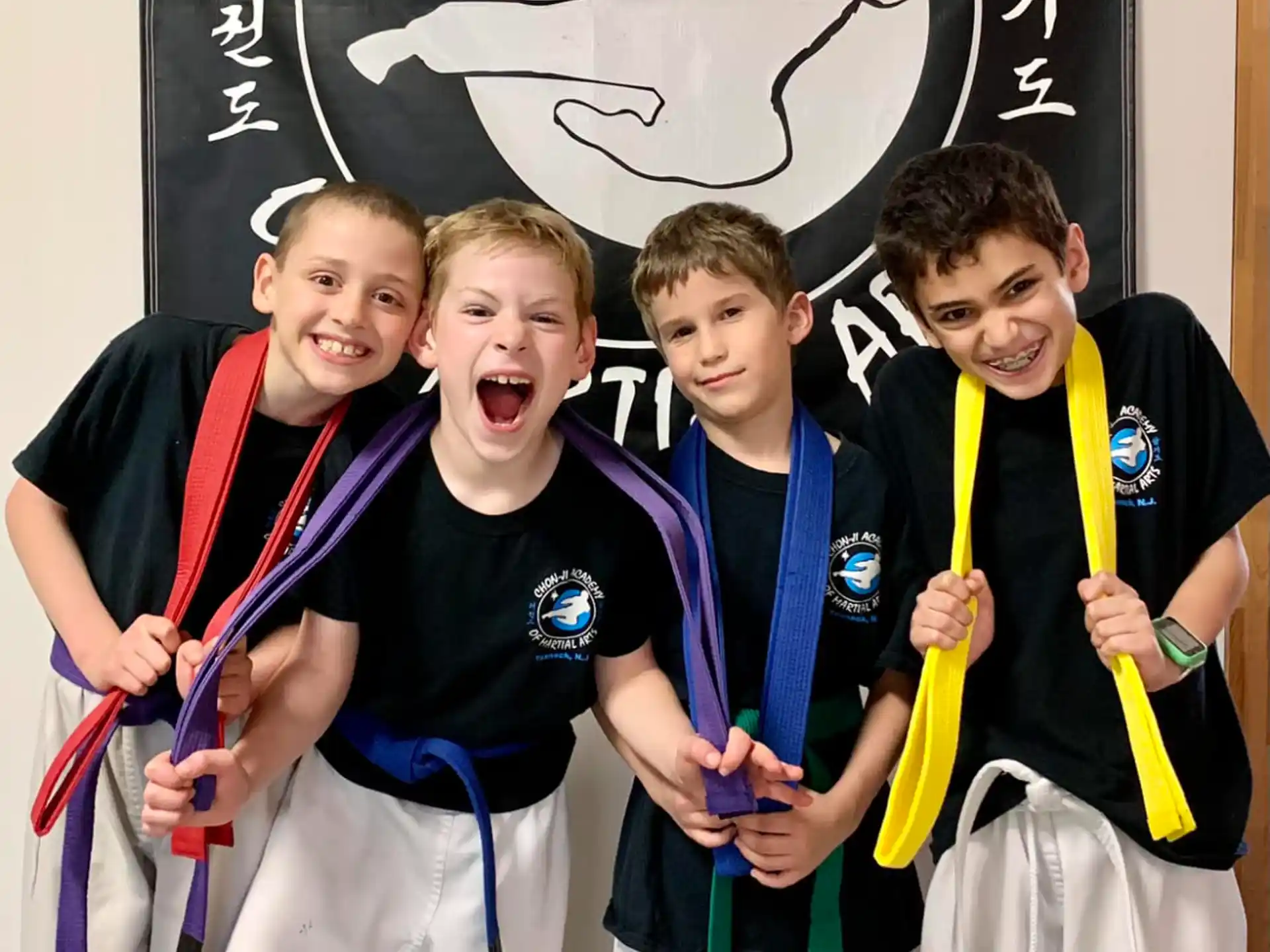 a group of kids posing for a picture