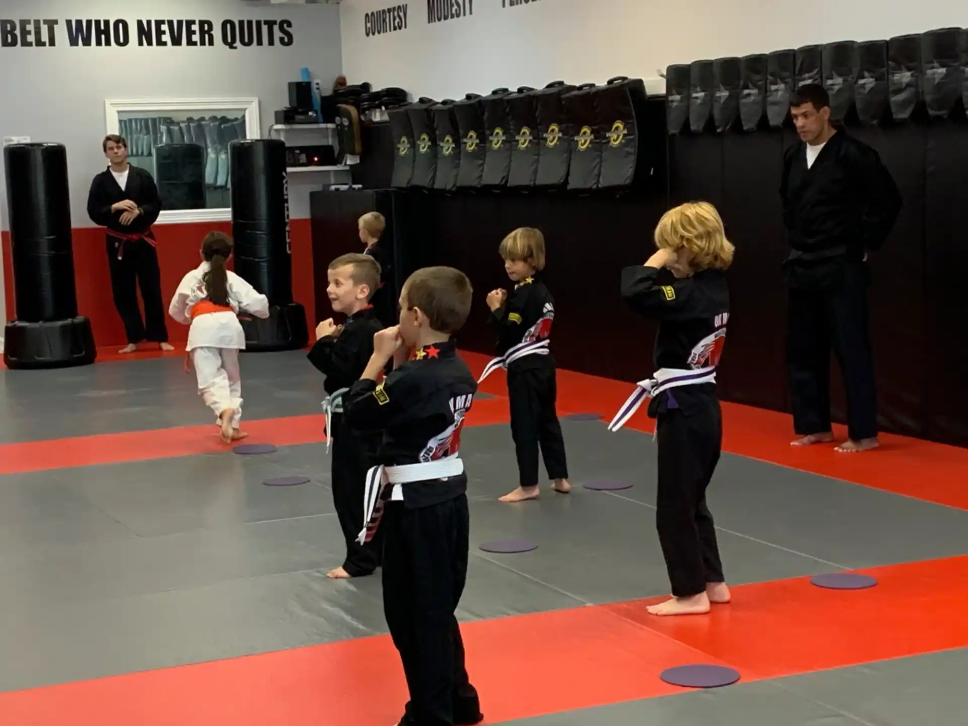 a group of children in a karate class