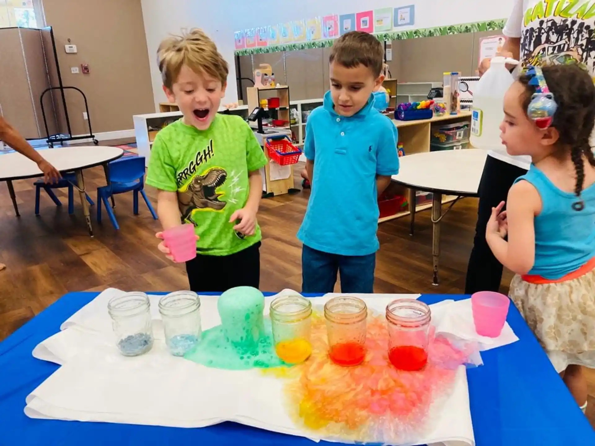 a group of children painting