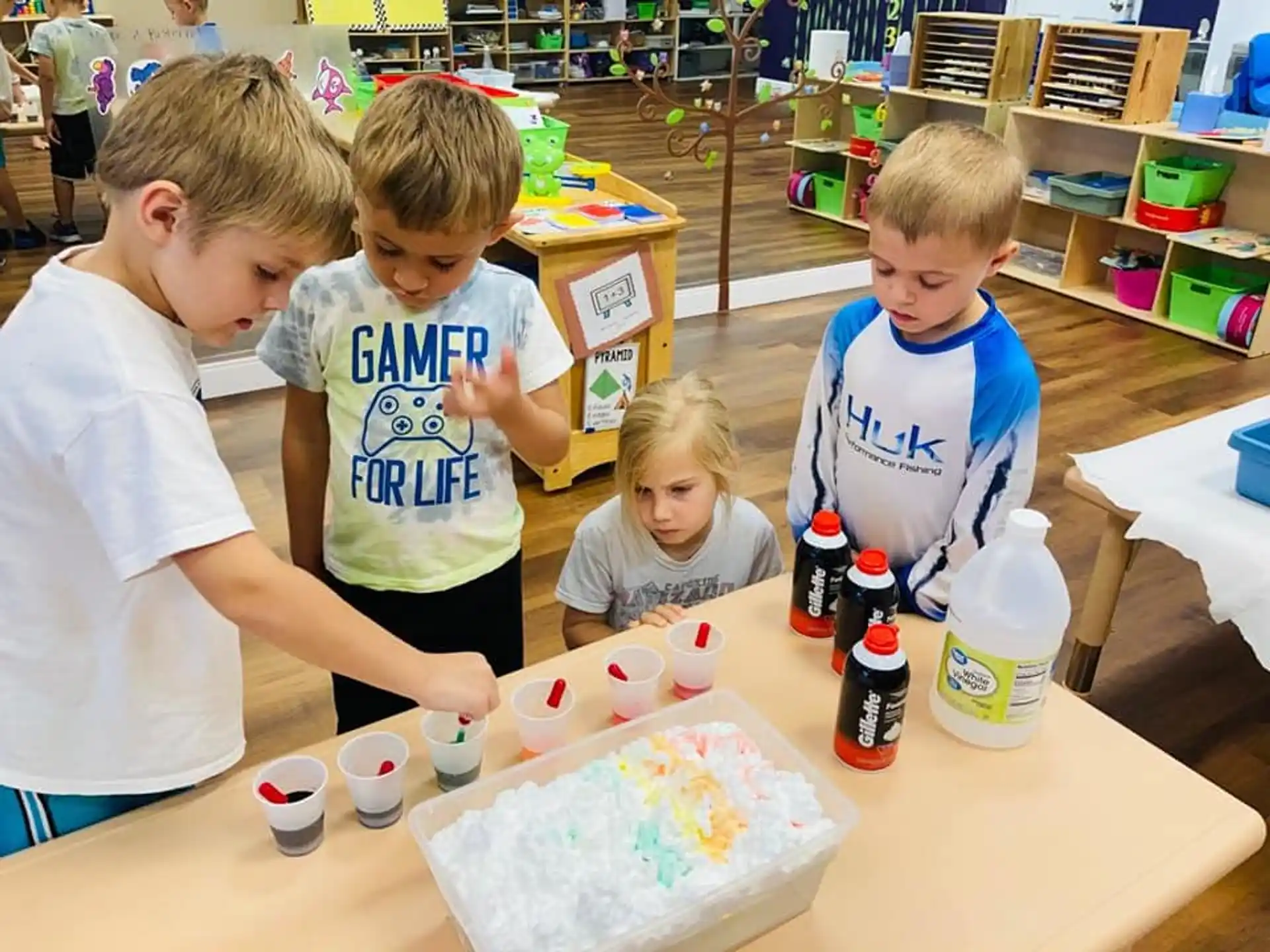 a group of children playing with toys