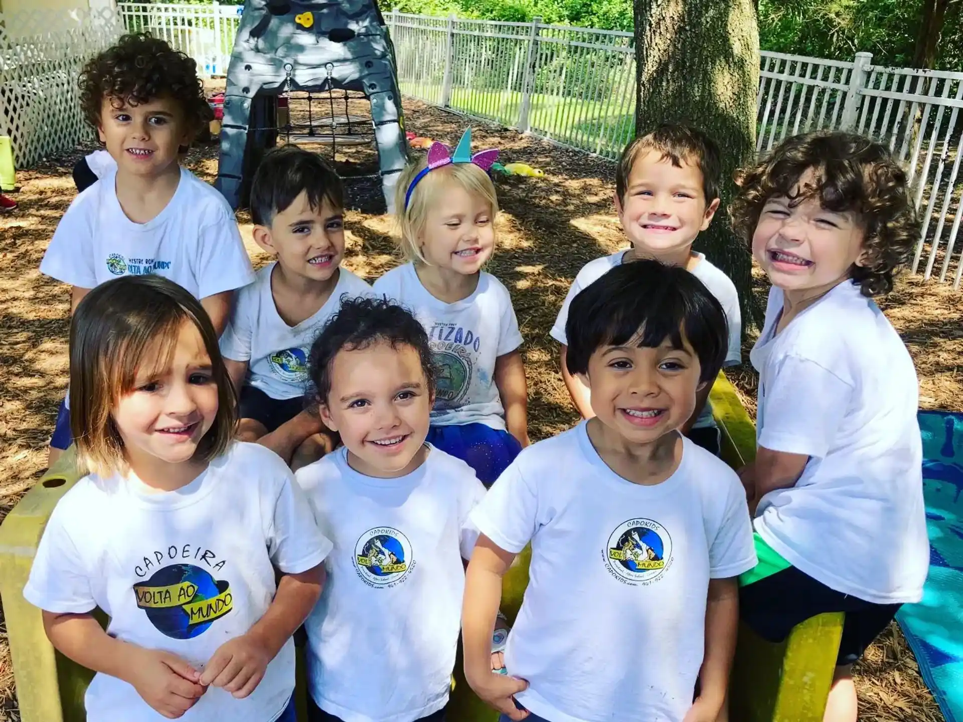 a group of children posing for a photo