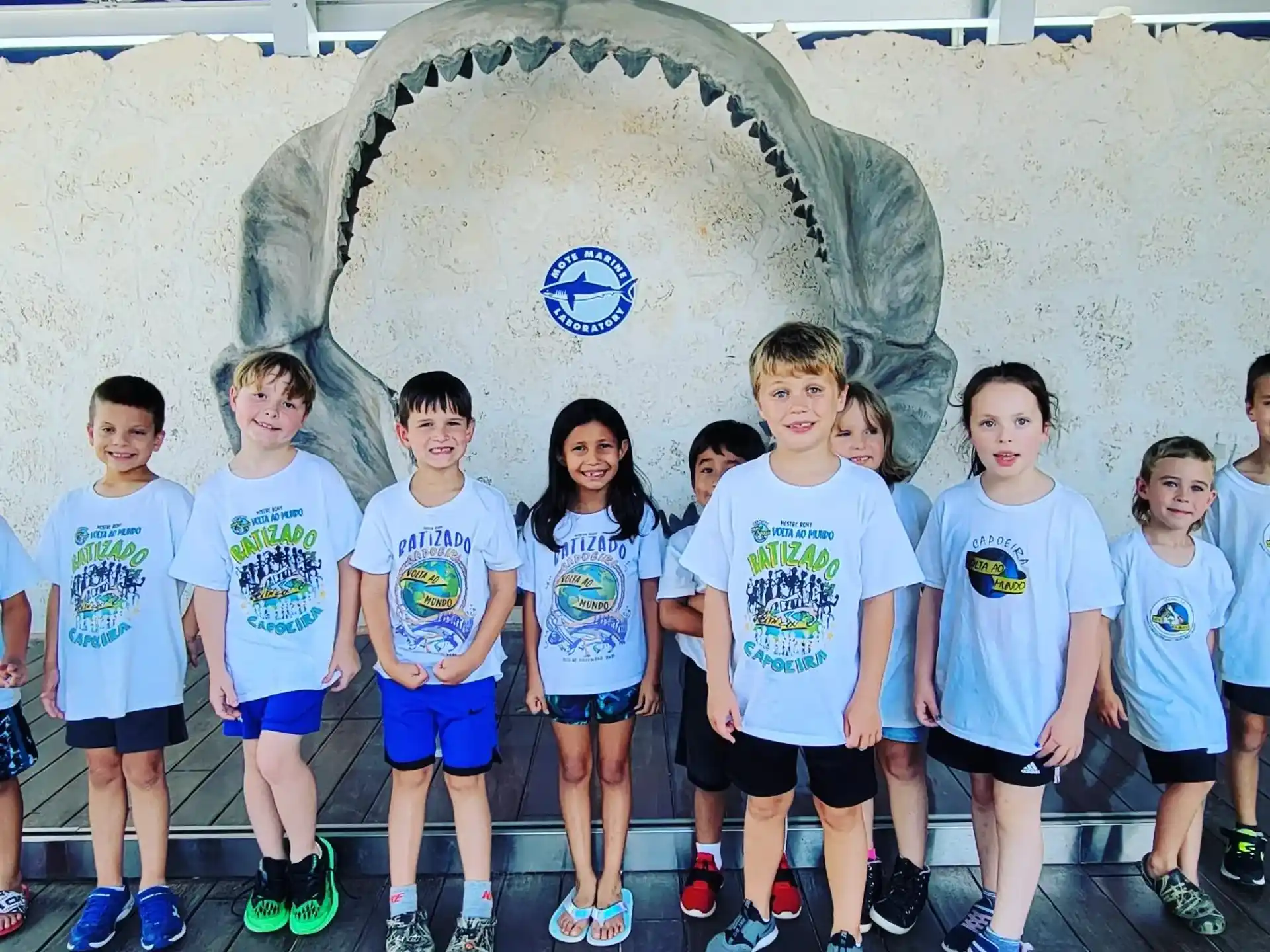 a group of children posing for a photo
