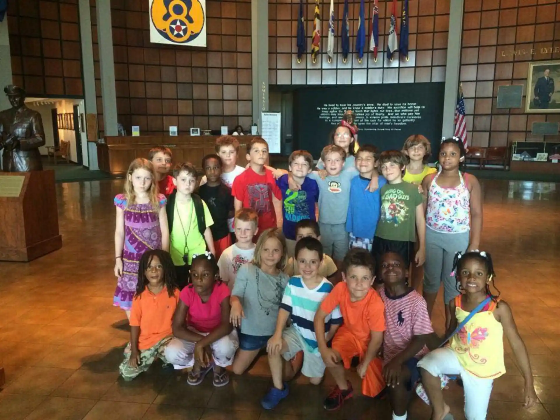 a group of children posing for a photo