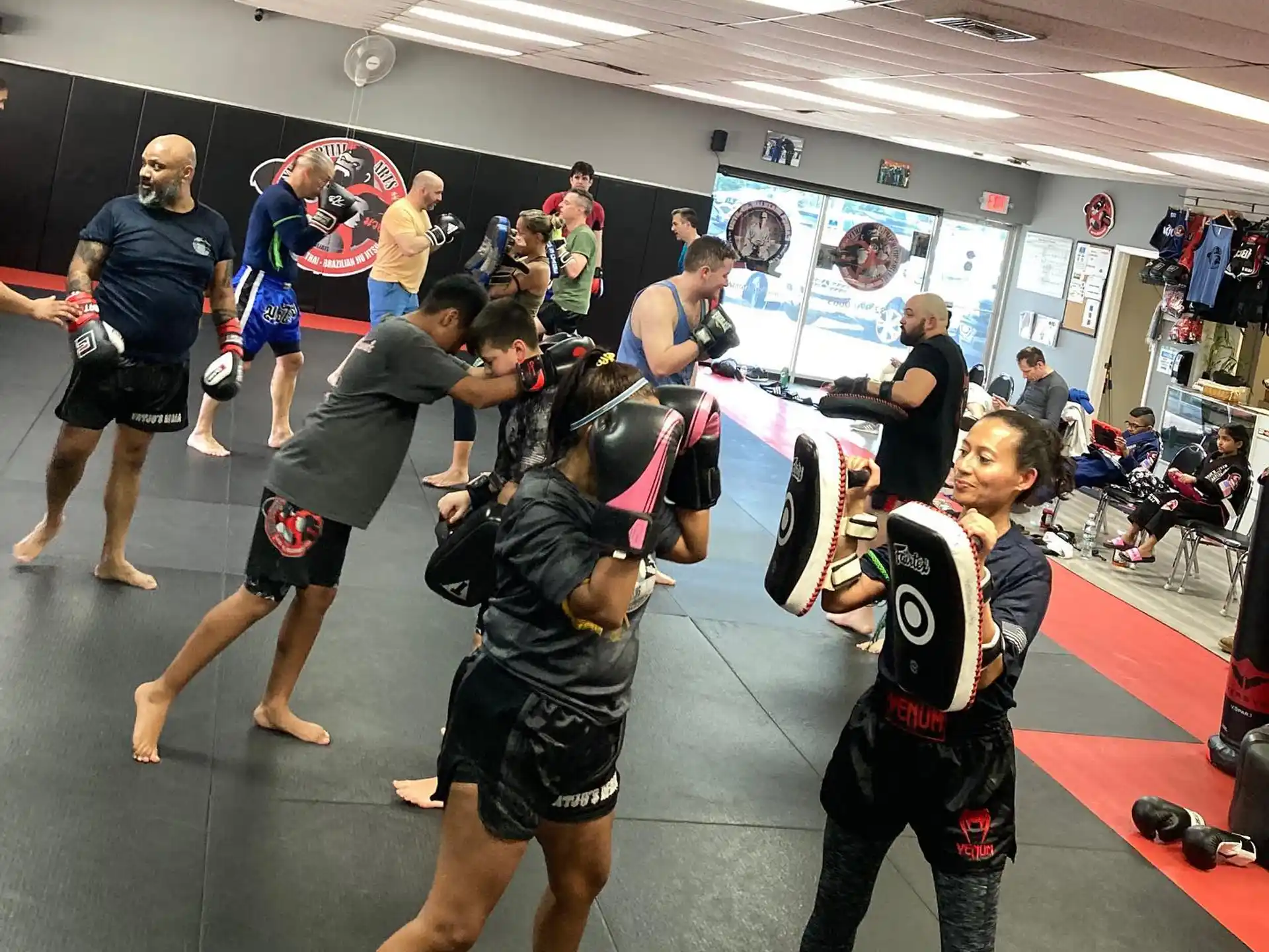 a group of people in a gym