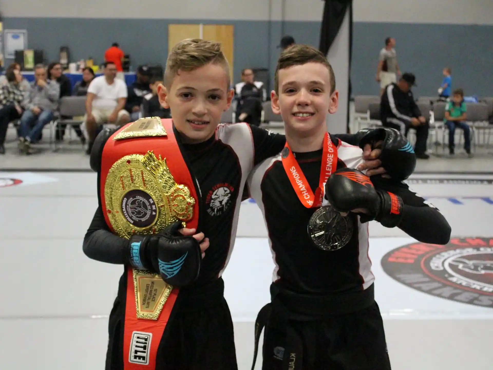 two men wearing boxing gloves