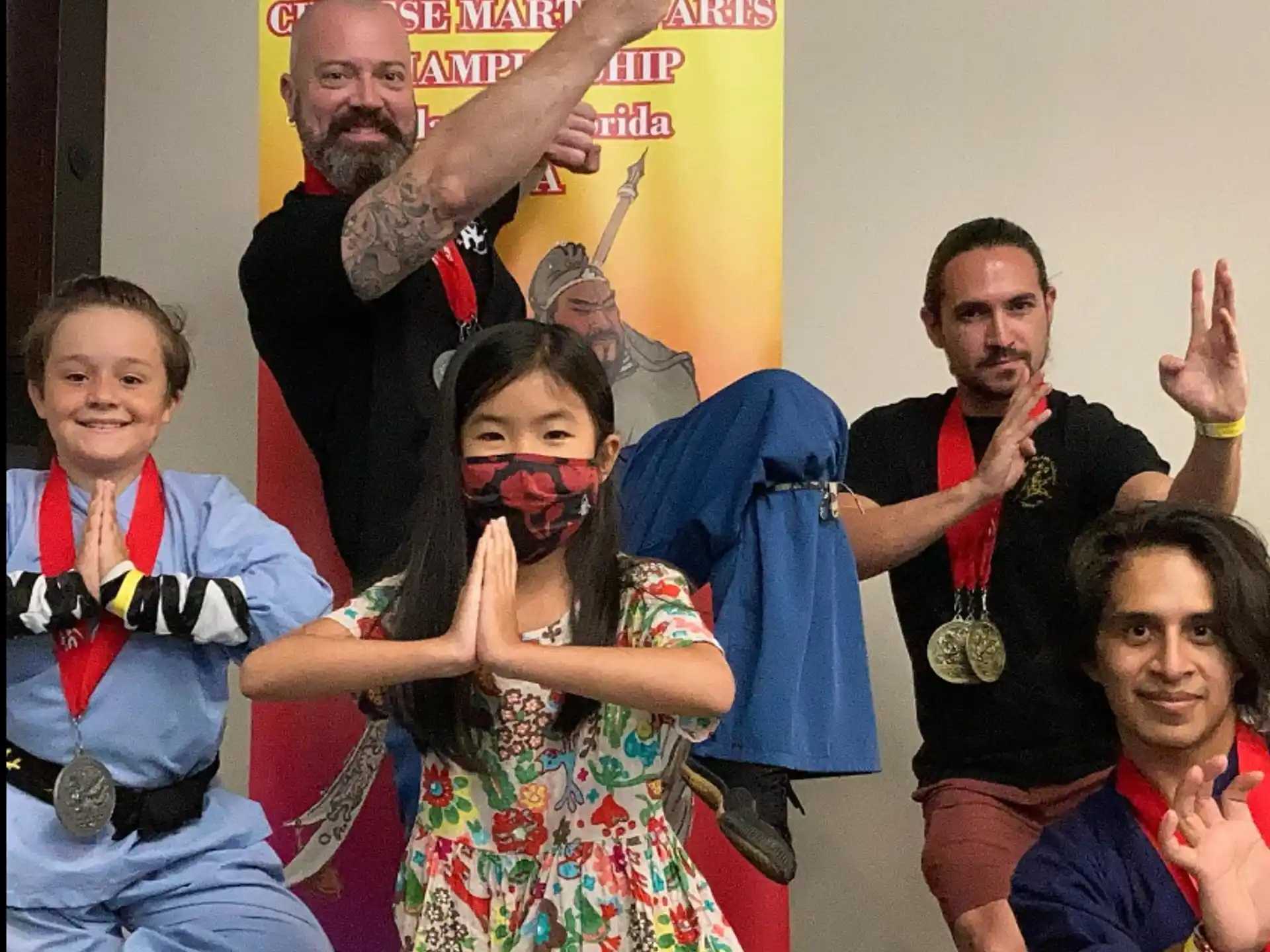 a group of people posing for a photo