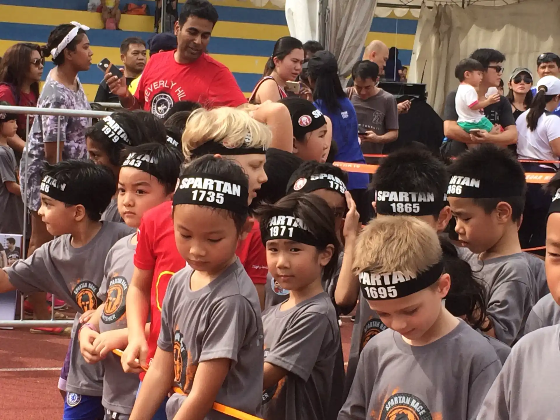a group of children wearing matching outfits