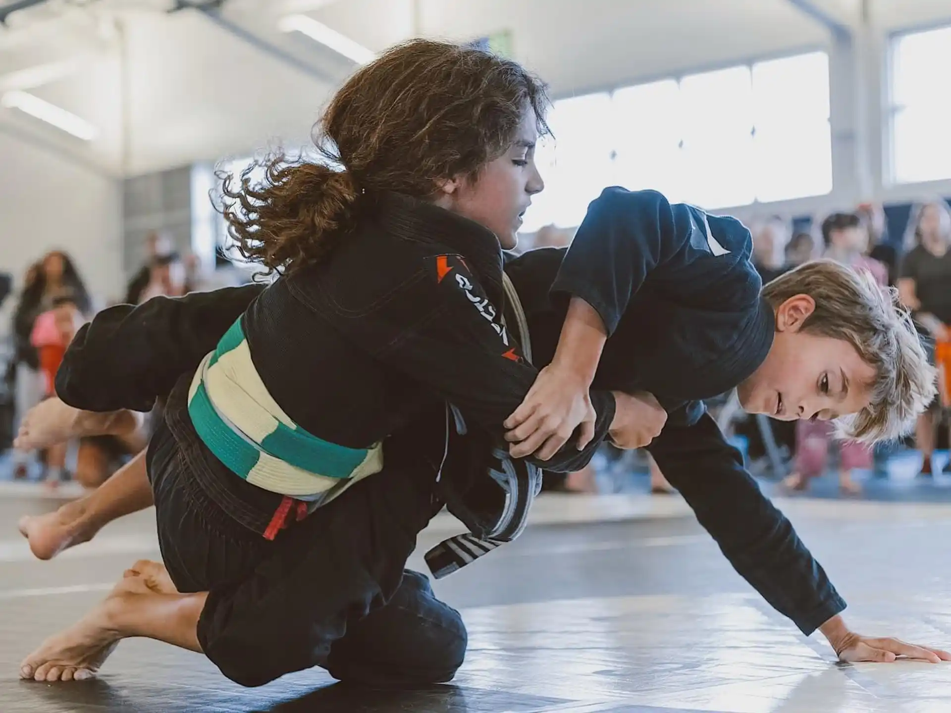 a couple of women doing yoga