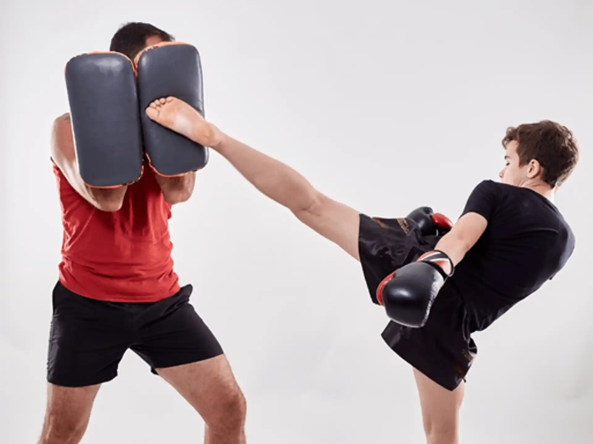 a man lifting another man