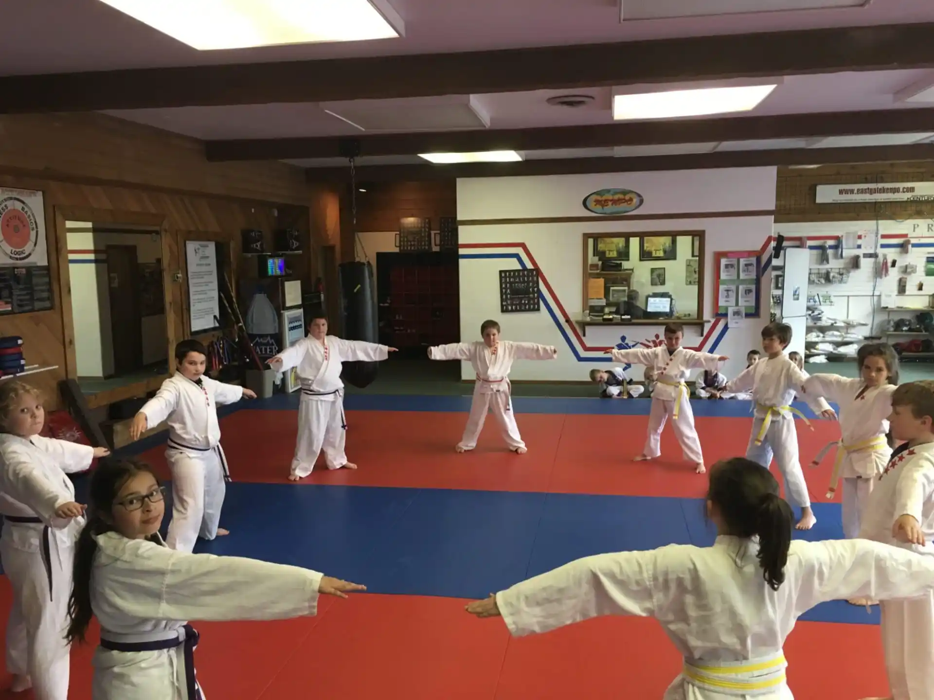 a group of people in karate uniforms