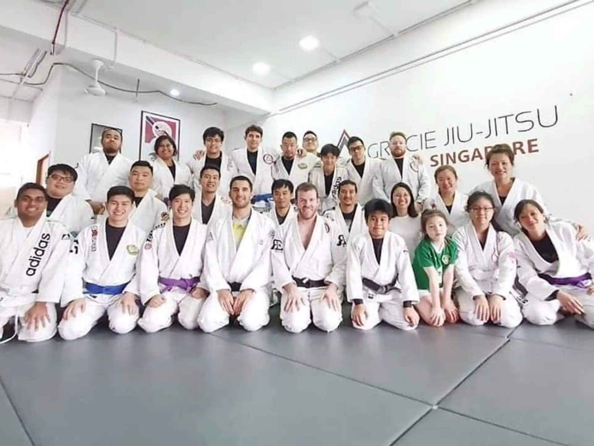 a group of people in white uniforms