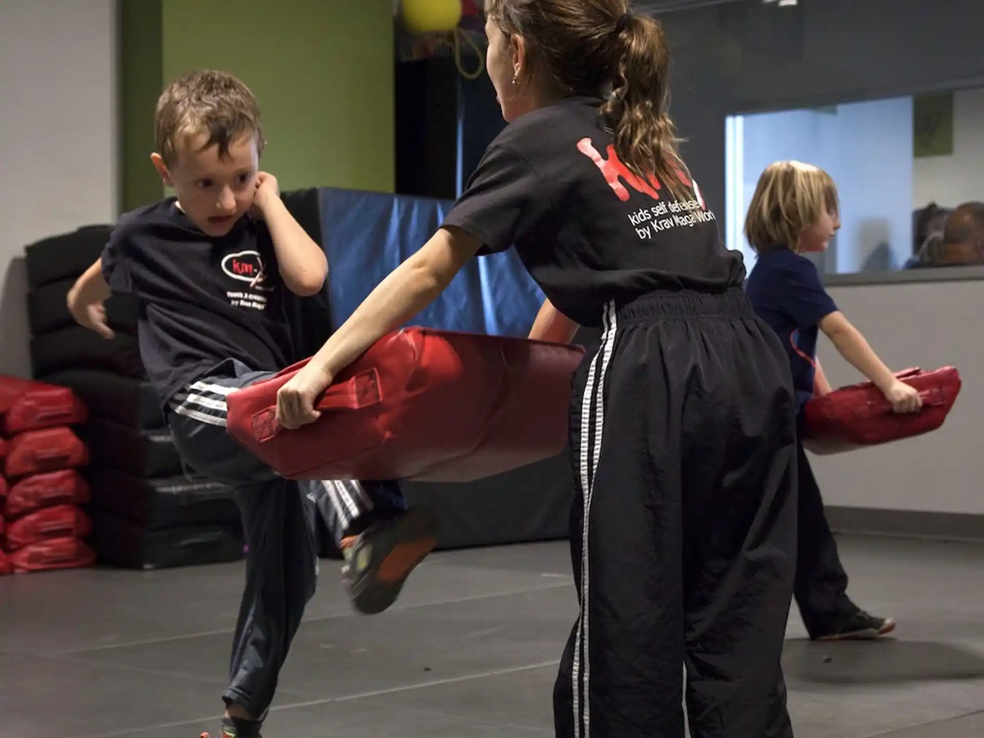a person and a boy exercising