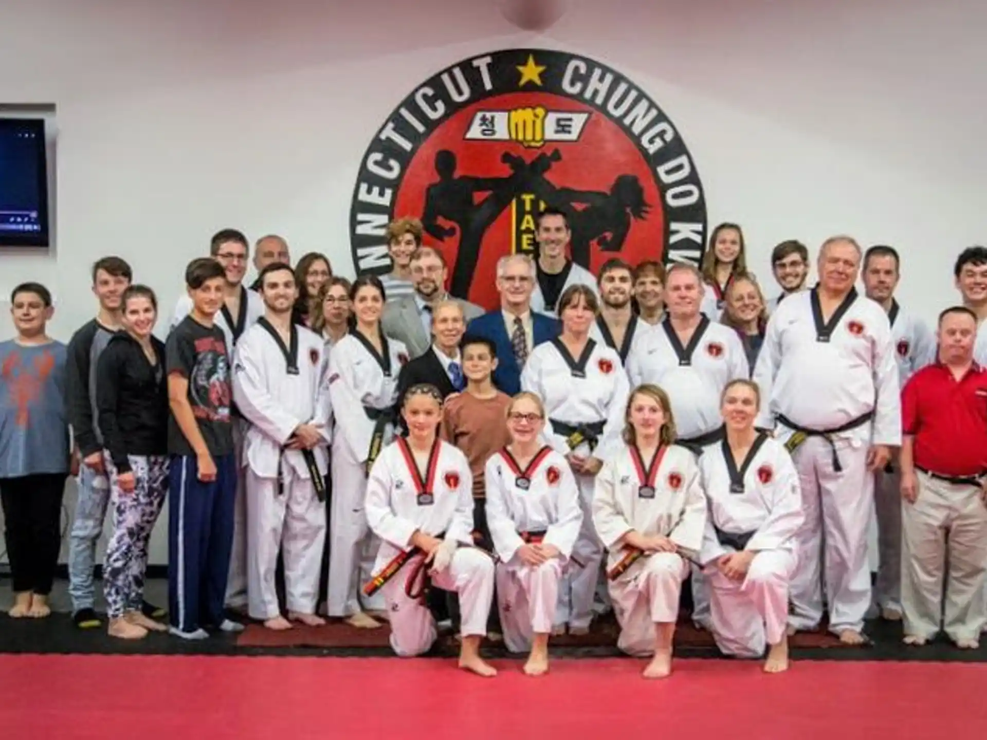 a group of people posing for a photo