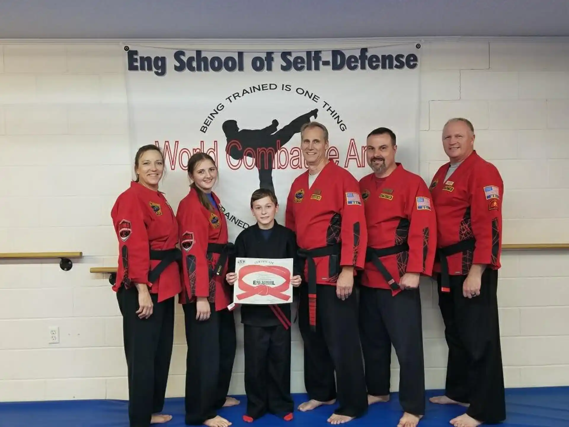 a group of people in red uniforms